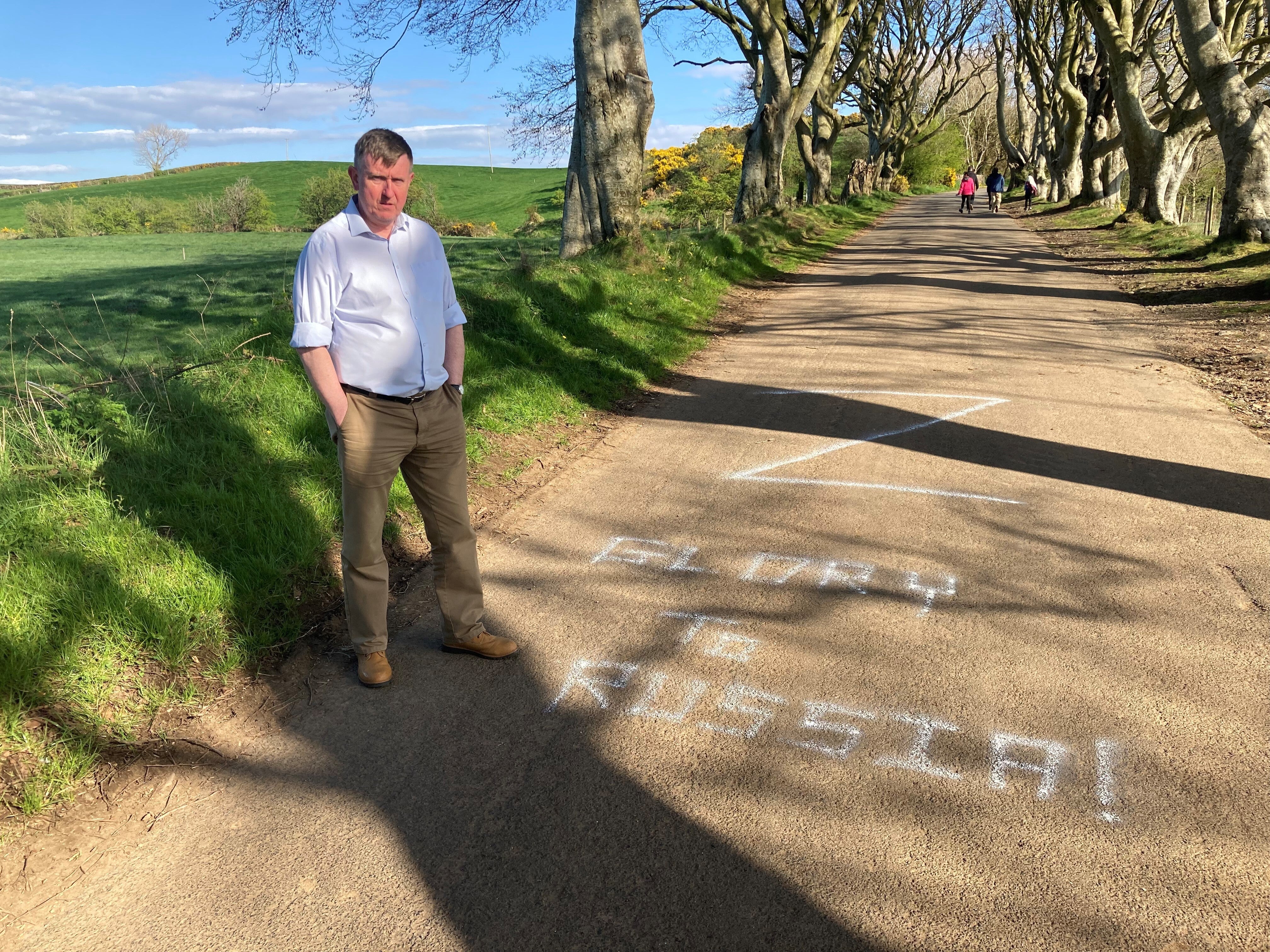 DUP North Antrim Assembly election candidate Mervyn Storey who has condemned pro-Russian graffiti which appeared on the road at the Dark Hedges in Co Antrim, a site made famous across the world after appearing in Game of Thrones. Issue date: Saturday April 23, 2022. (Handout/PA)