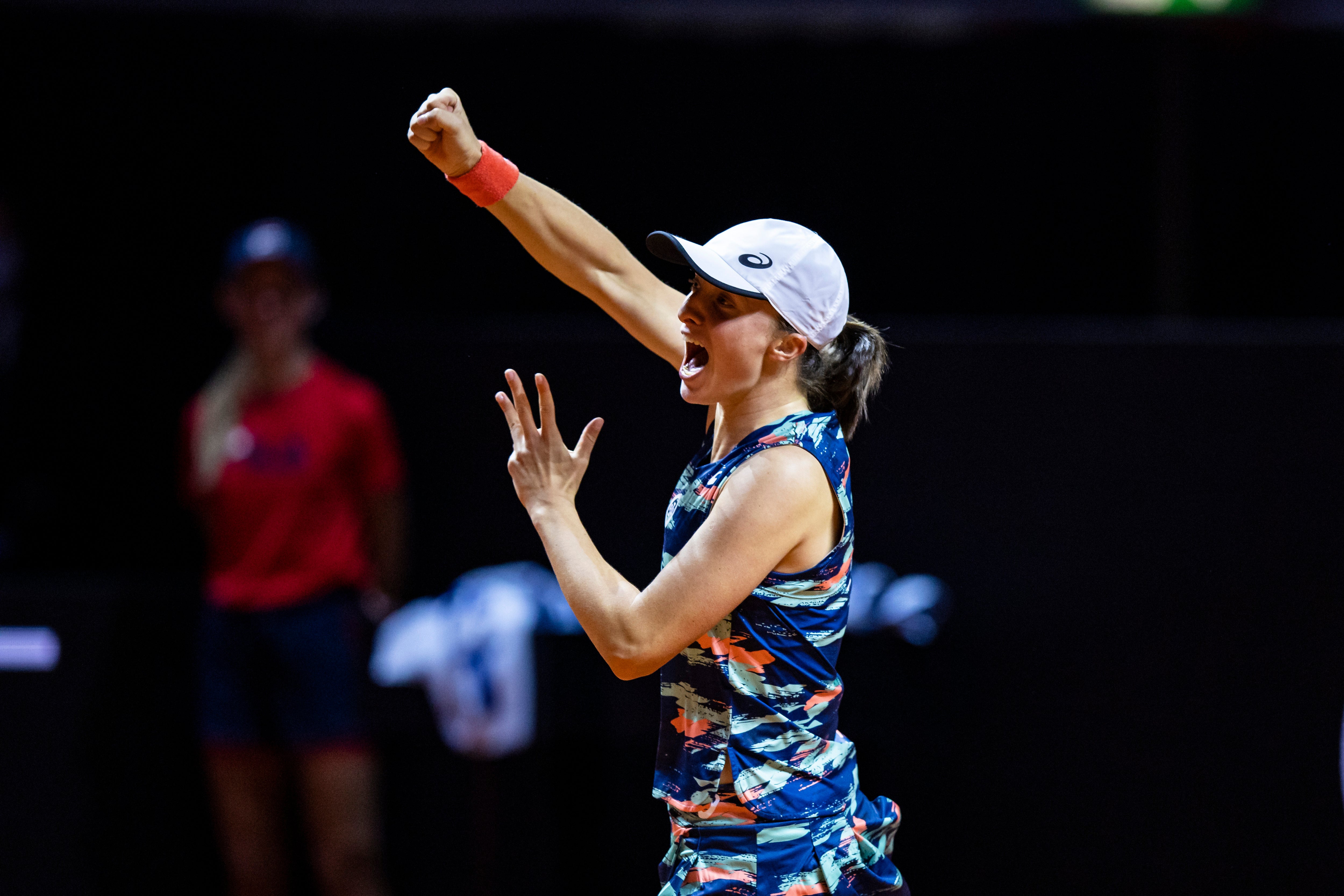 Iga Swiatek celebrates after beating Aryna Sabalenka in Stuttgart (Tom Weller/DPA via AP)