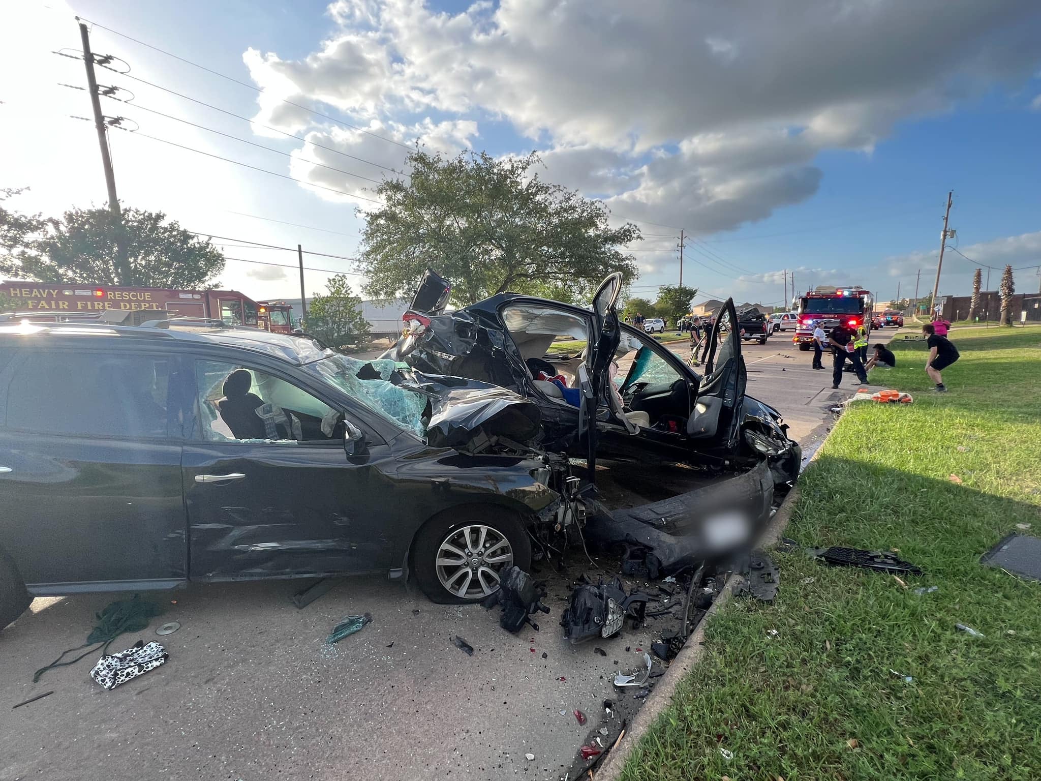 Pedrie Wannenburg’s vehicle, right, shows the impact of the crash