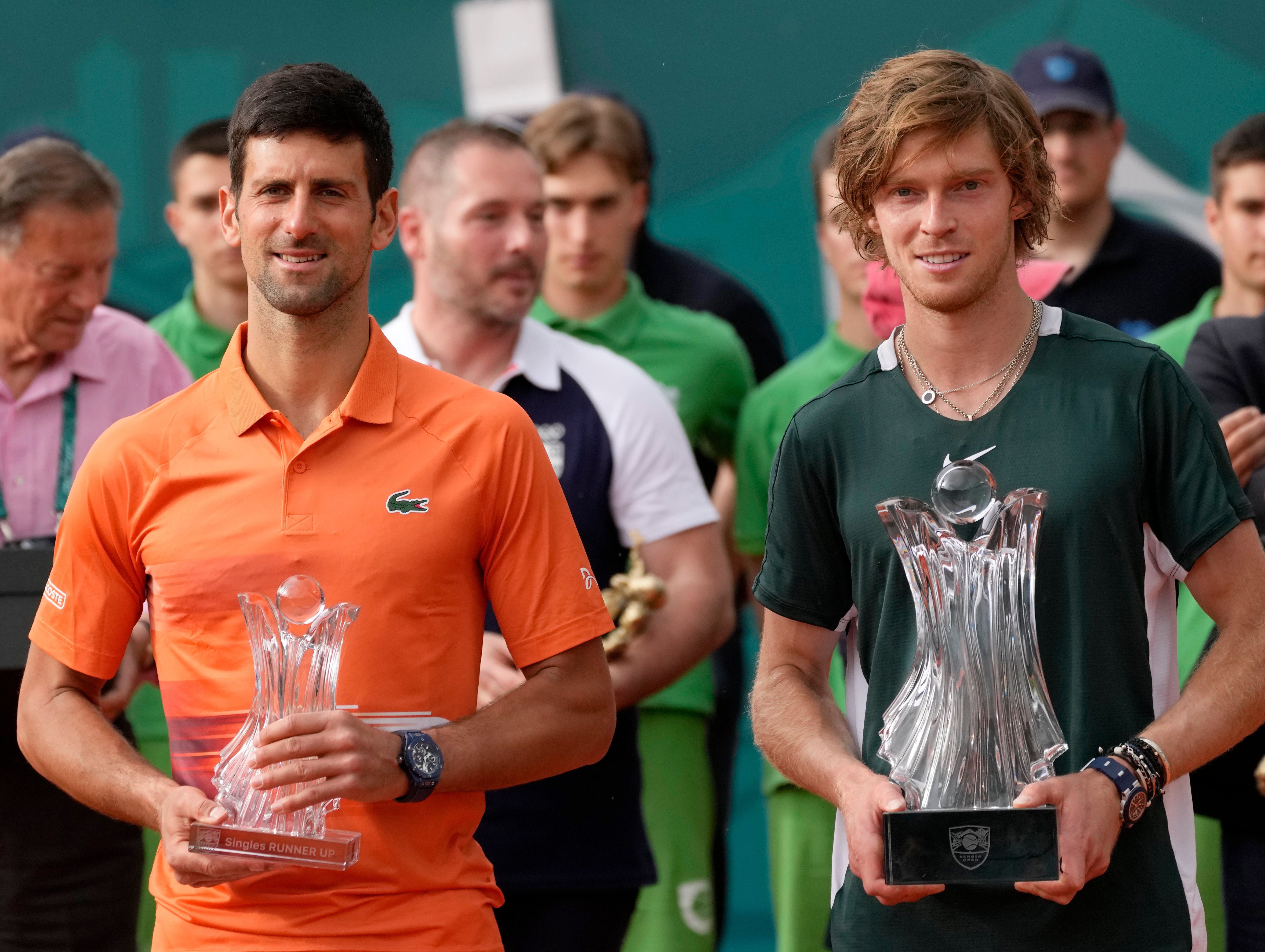 Andrey Rublev, right, defeated Novak Djokovic (Darko Vojinovic/AP/PA)