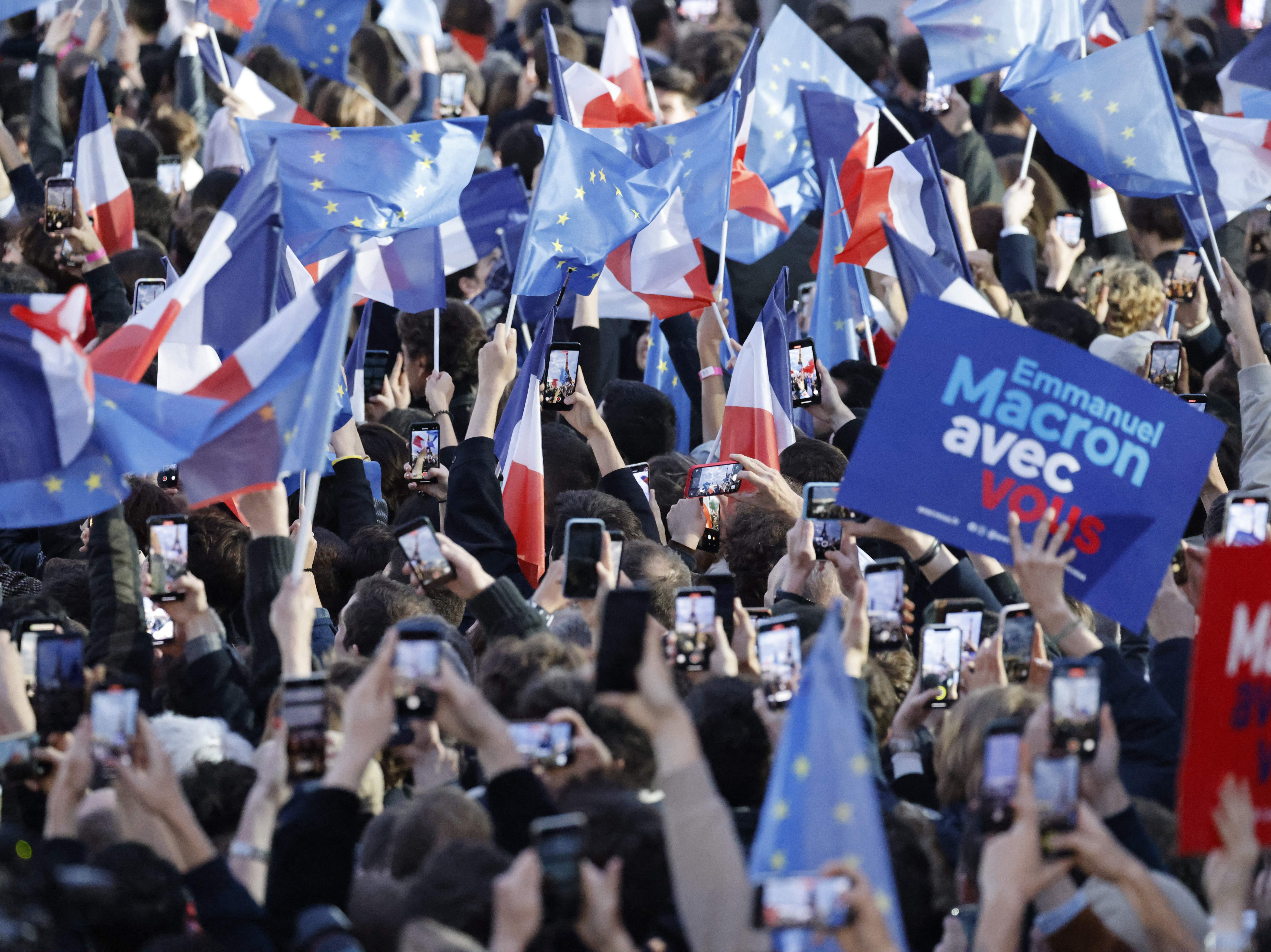 Macron supporters celebrate in the Champ de Mars in Paris