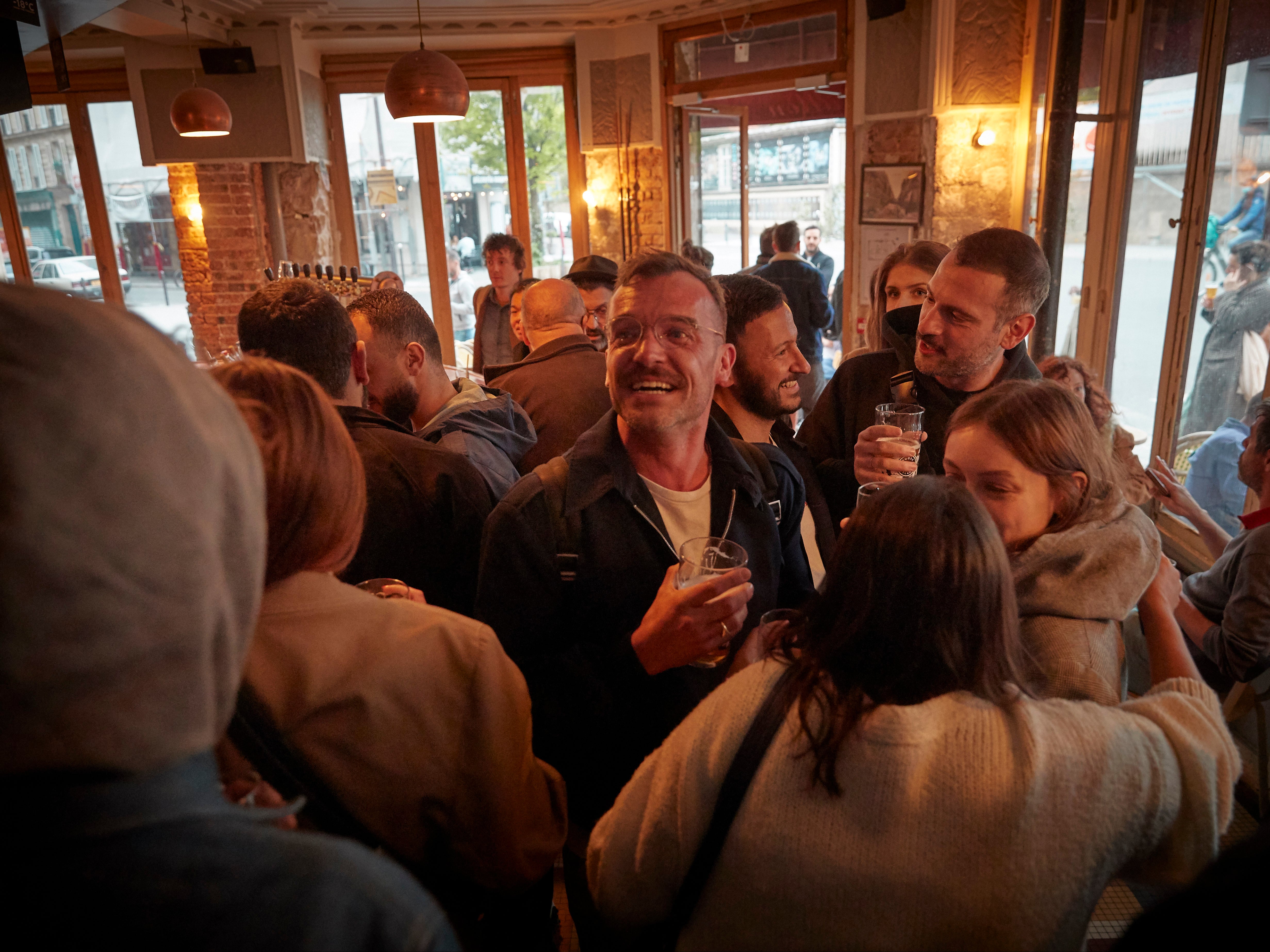 French voters celebrate in Le Carillon in Paris