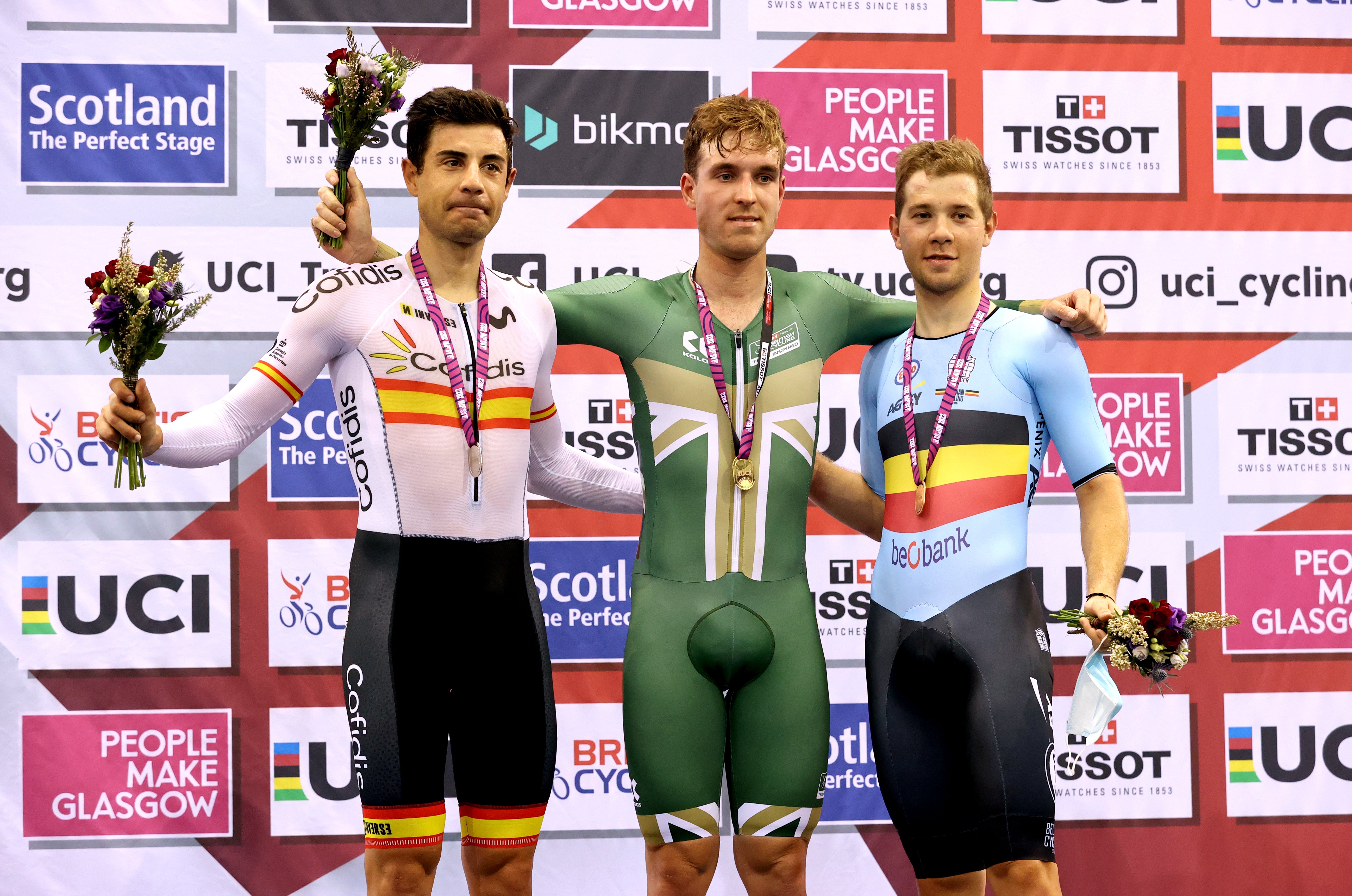 Ollie Wood (centre) celebrates after winning gold in the Men’s Omnium at the Tissot UCI Track Nations Cup in Glasgow (Steve Welsh/PA)