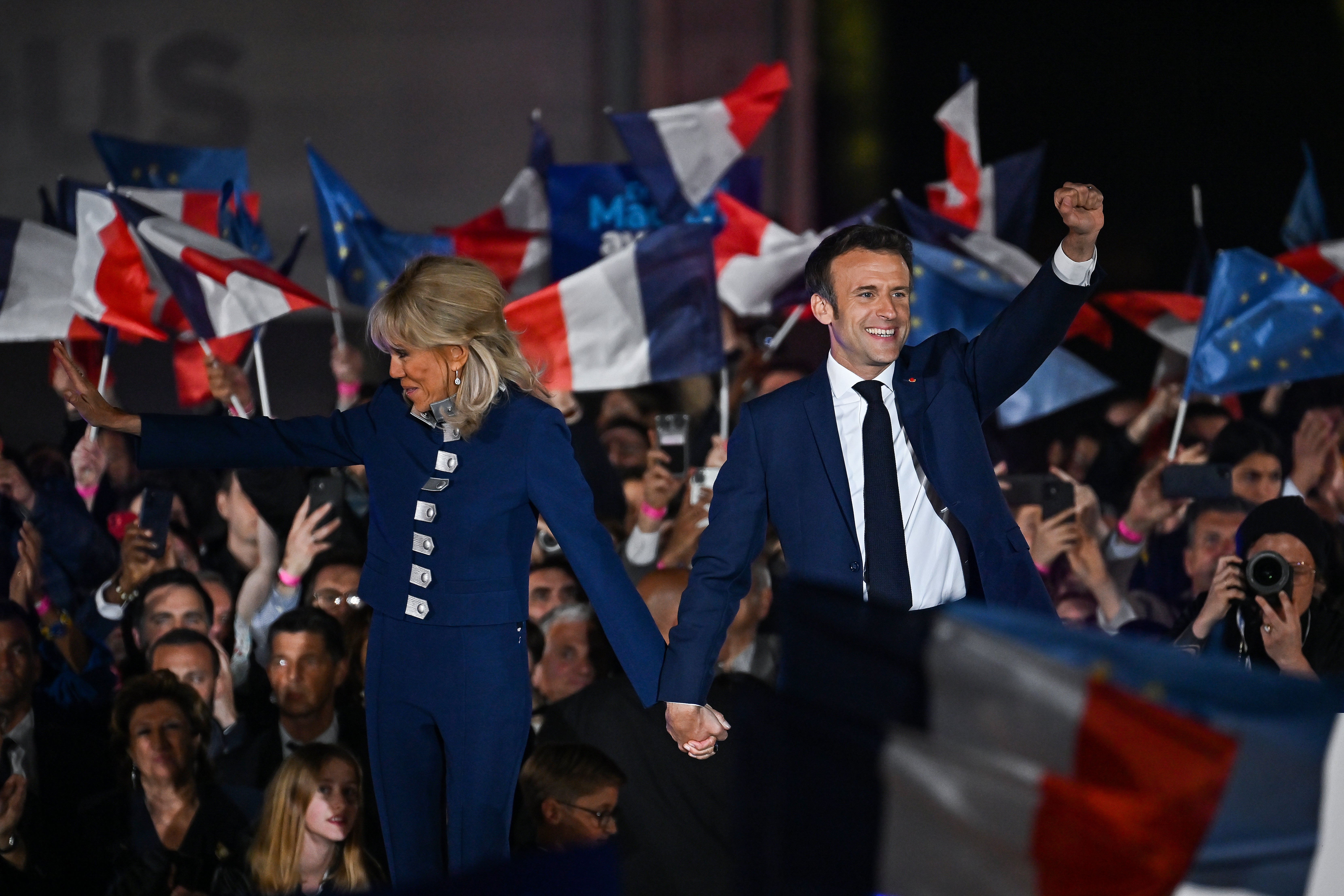 Macron and his wife Brigitte thank supporters on Sunday night