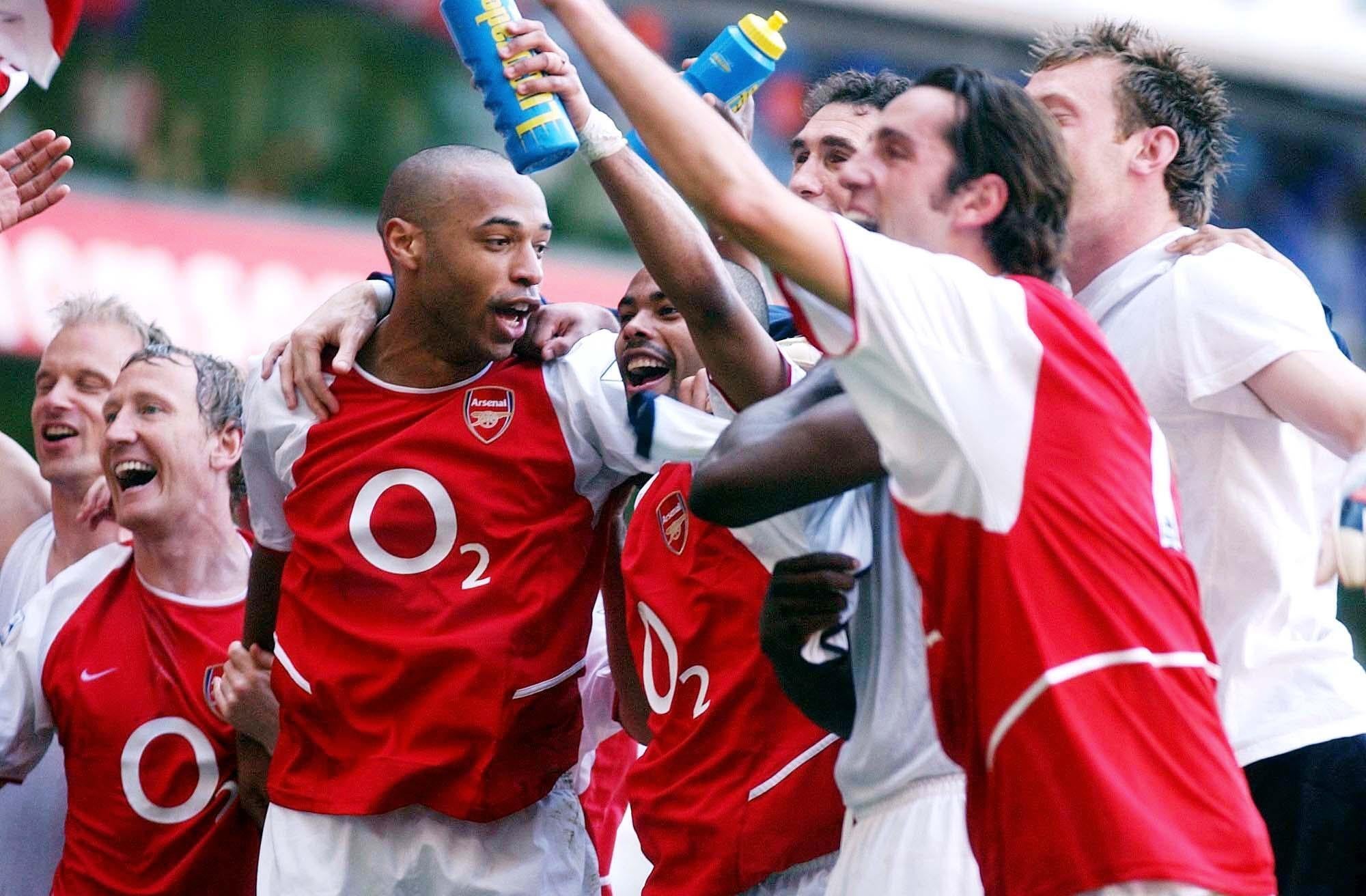 Arsenal players celebrate after their title win (Sean Dempsey/PA)