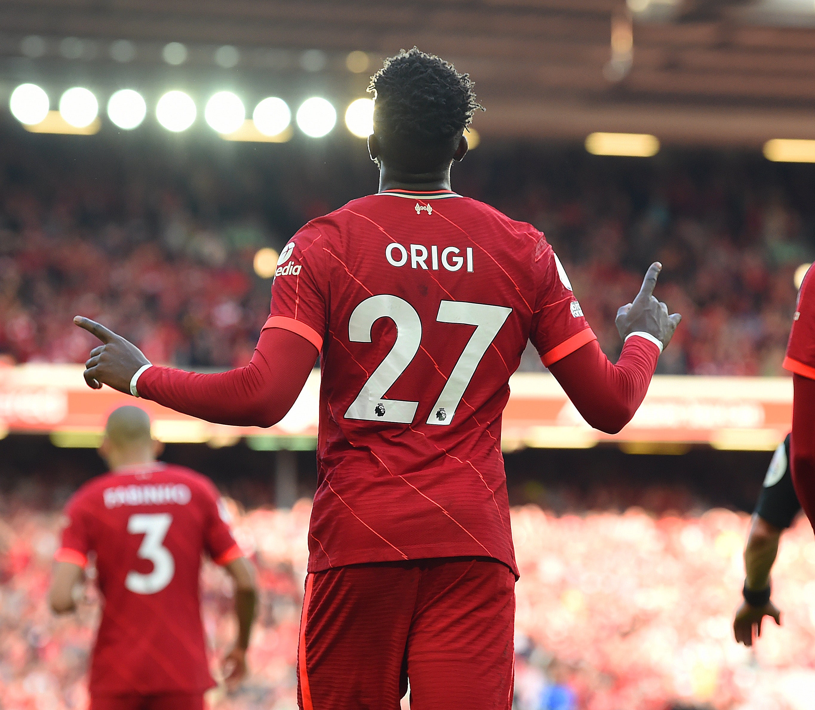 Divock Origi celebrates scoring against Everton at Anfield