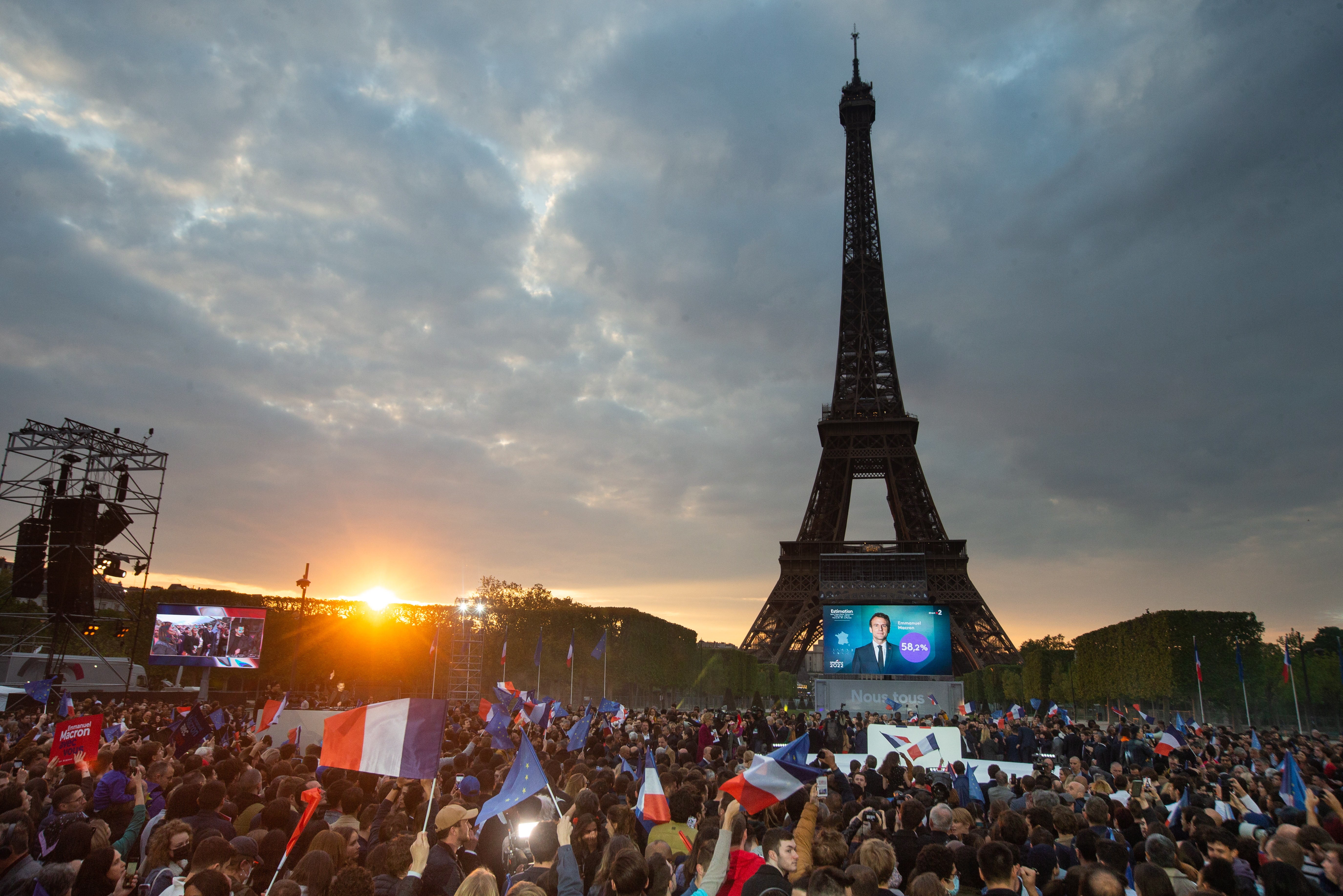 Supporters of Macron celebrate at the Champ de Mars in Paris, 24 April 2022