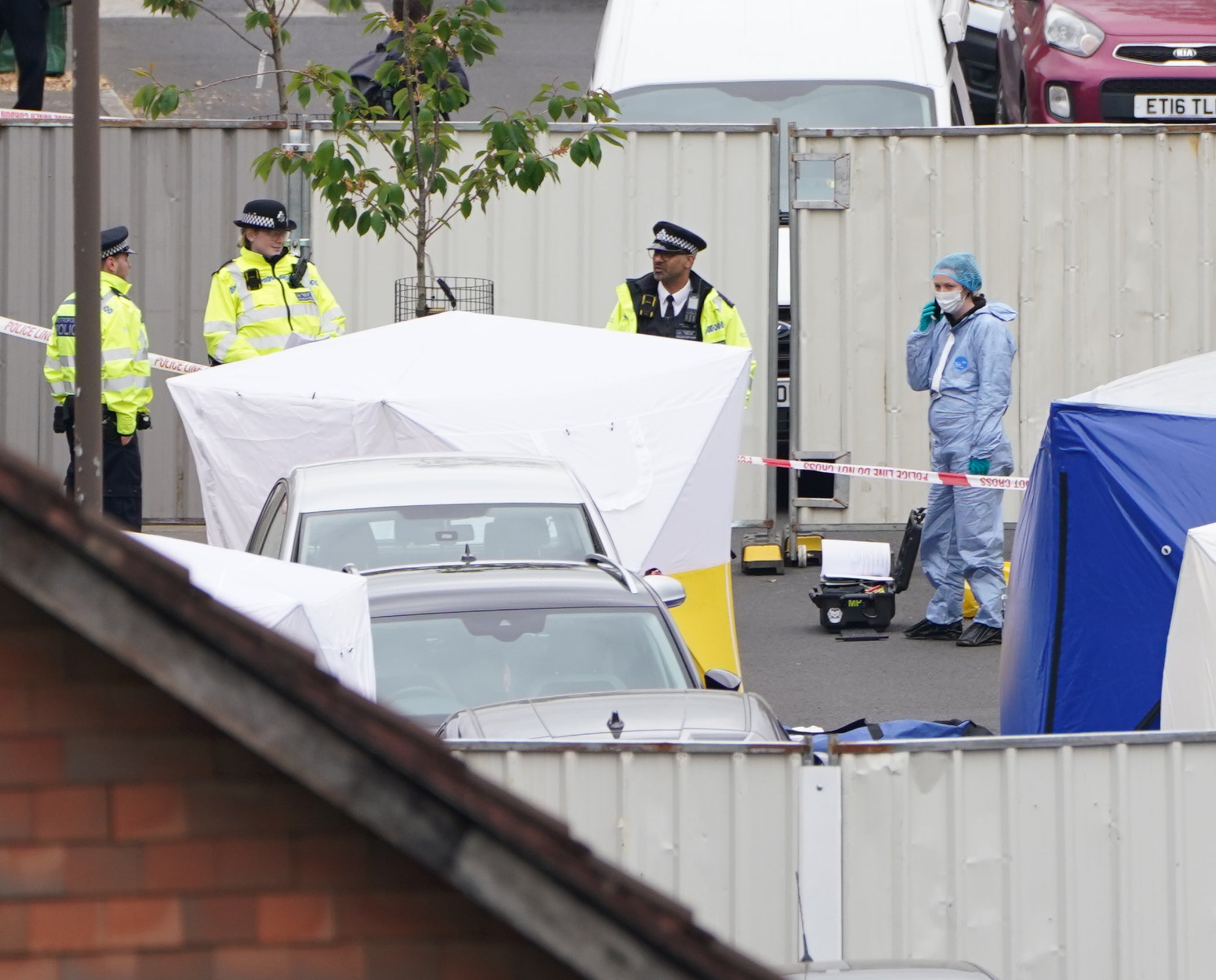 Police forensic tents outside a house in Bermondsey, south-east London, after three women and a man were stabbed to death in the early hours of Monday (Kirsty O’Connor/PA)