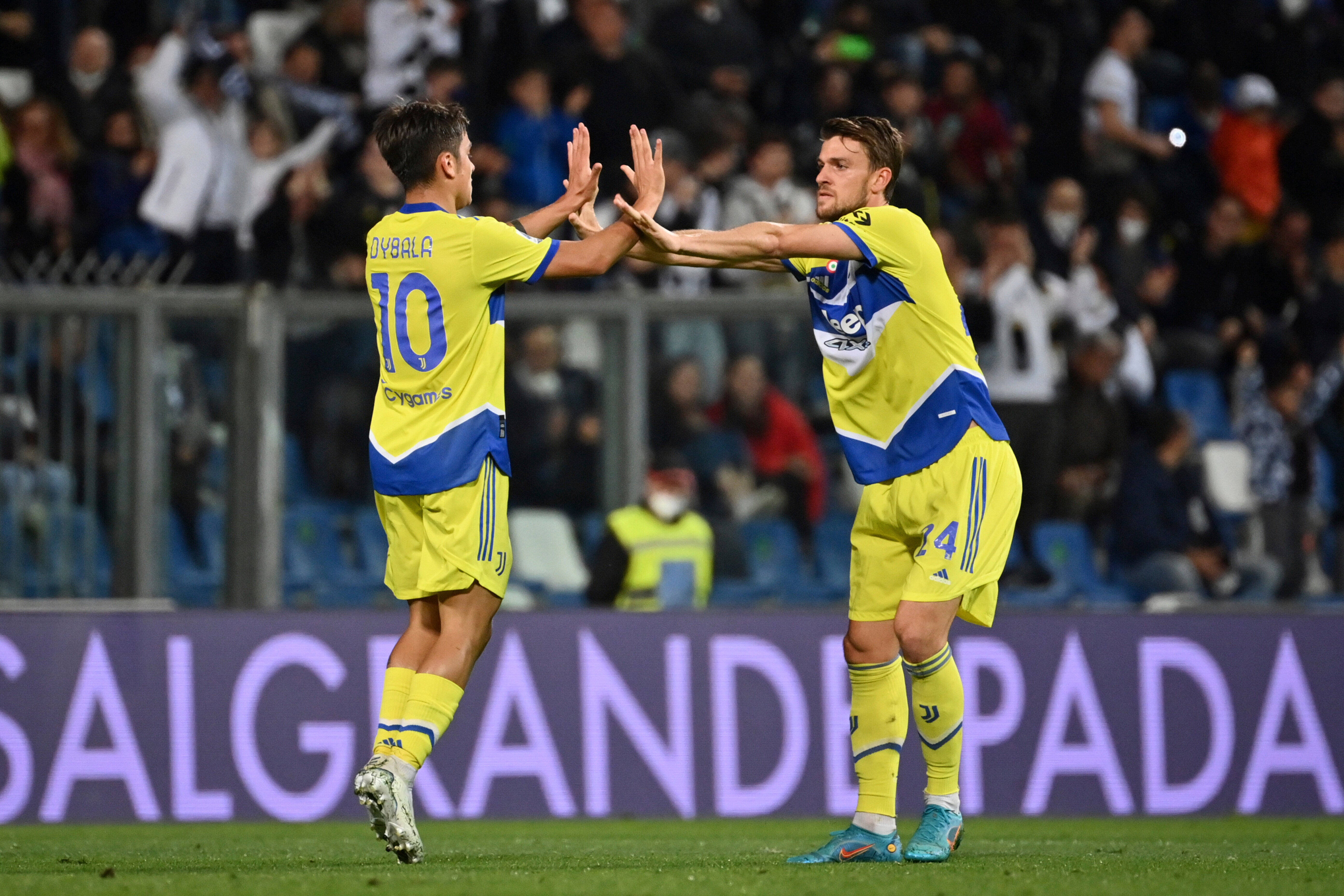 Paulo Dybala, left, drew Juventus level before they went on to win at Sassuolo (Massimo Paolone/AP)