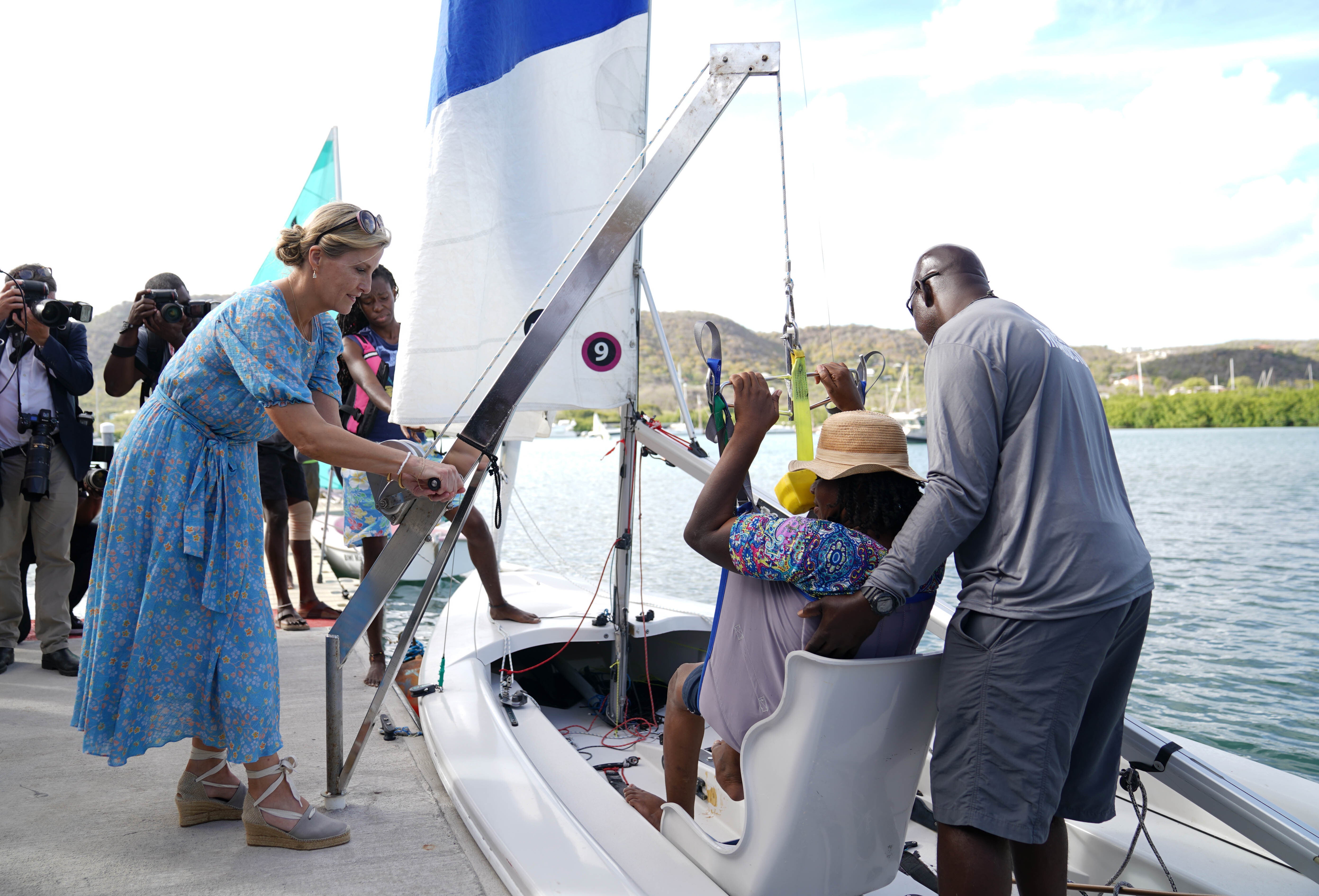 The Countess of Wessex helps a disabled sailor onto their boat (Joe Giddens/PA)