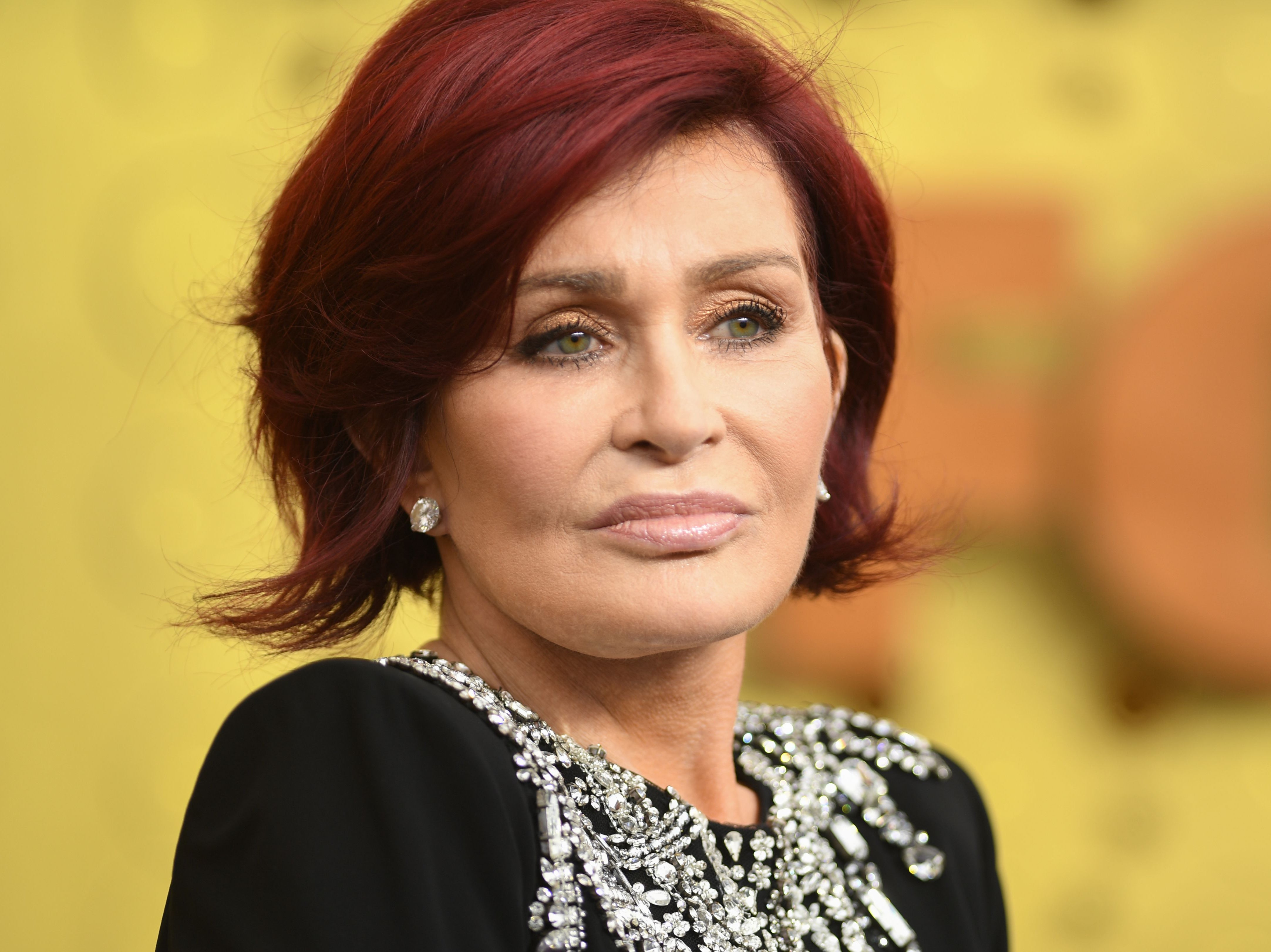 Former X Factor judge Sharon Osbourne was seen in the line comforting other mourners