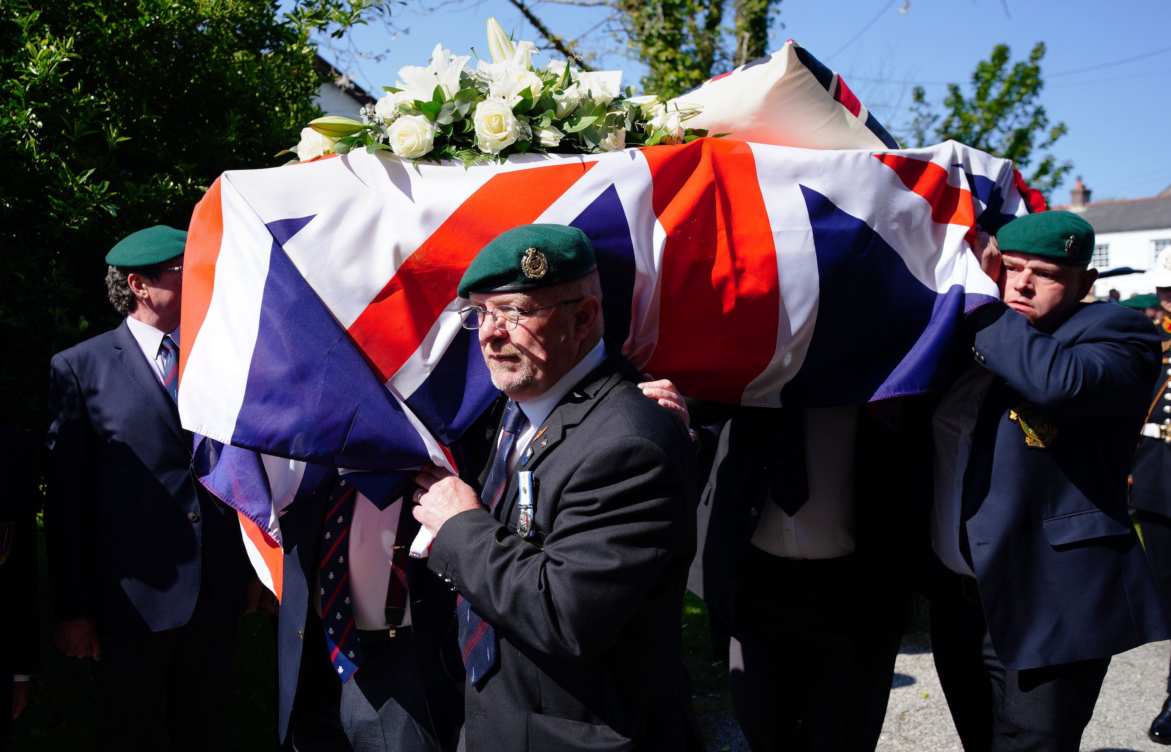 The coffin of 96-year-old Harry Billinge is carried into St Paul’s Church in Charlestown, Cornwall (Ben Birchall/PA)