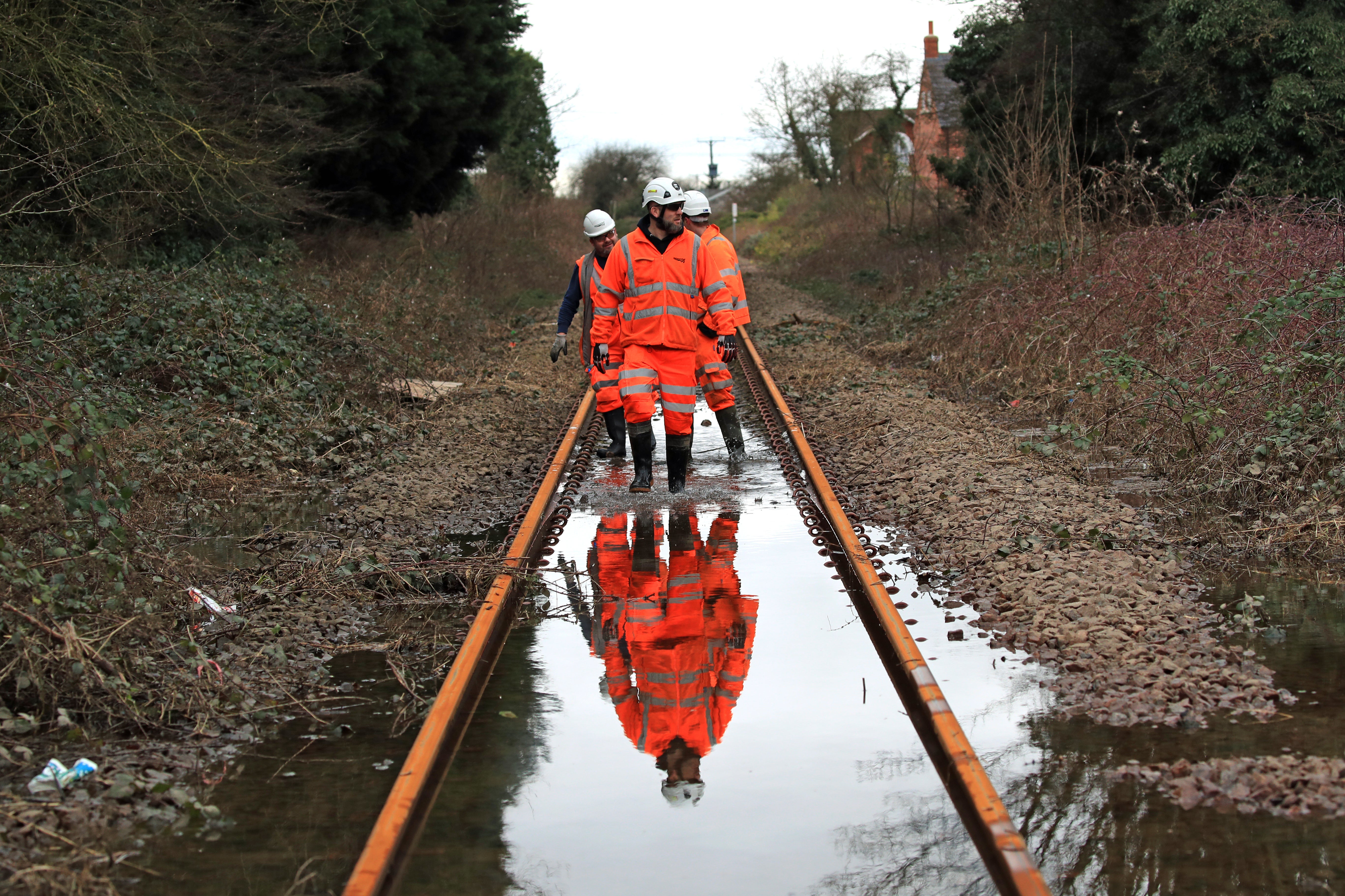 Rail workers voting on strikes over pay were angered after a communications boss suggested they ‘should have probably worked harder at school’ (Danny Lawson/PA)