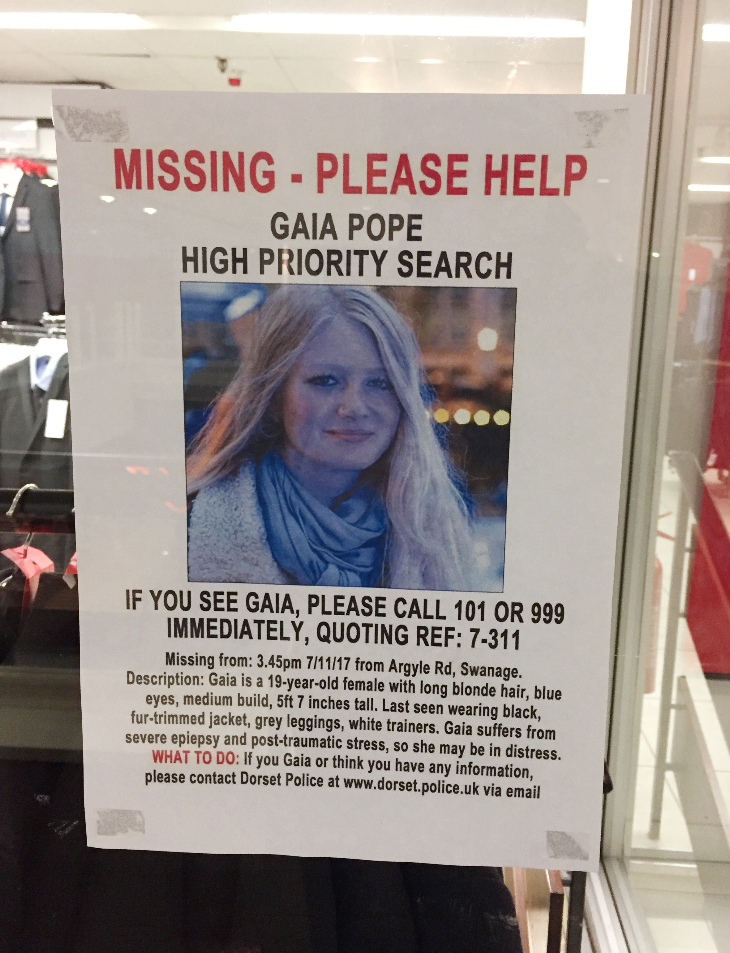 An appeal poster for missing teenager Gaia Pope in a window of Beales Department Stores in Poole, Dorset.