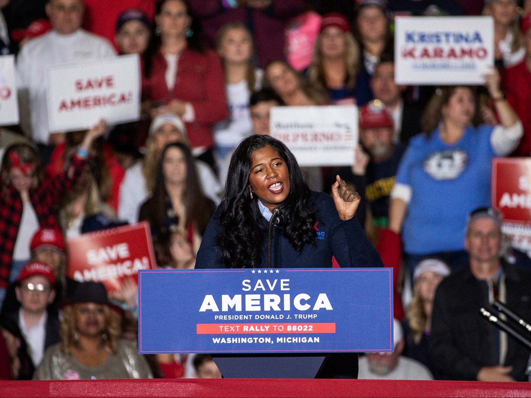 Kristina Karamo, Republican candidate for Michigan Secretary of State, speaks at a rally at the Michigan Stars Sports Center in Washington Township, Mich., Saturday, April 2, 2022. Former President Donald Trump's extraordinary effort to mold Republicans' 2022 tickets will be put to the test this weekend in Michigan, where thousands of party activists will endorse candidates including in a contentious attorney general's race.