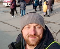 Ukrainian man with van evacuates 200 from Mariupol in battered red vehicle