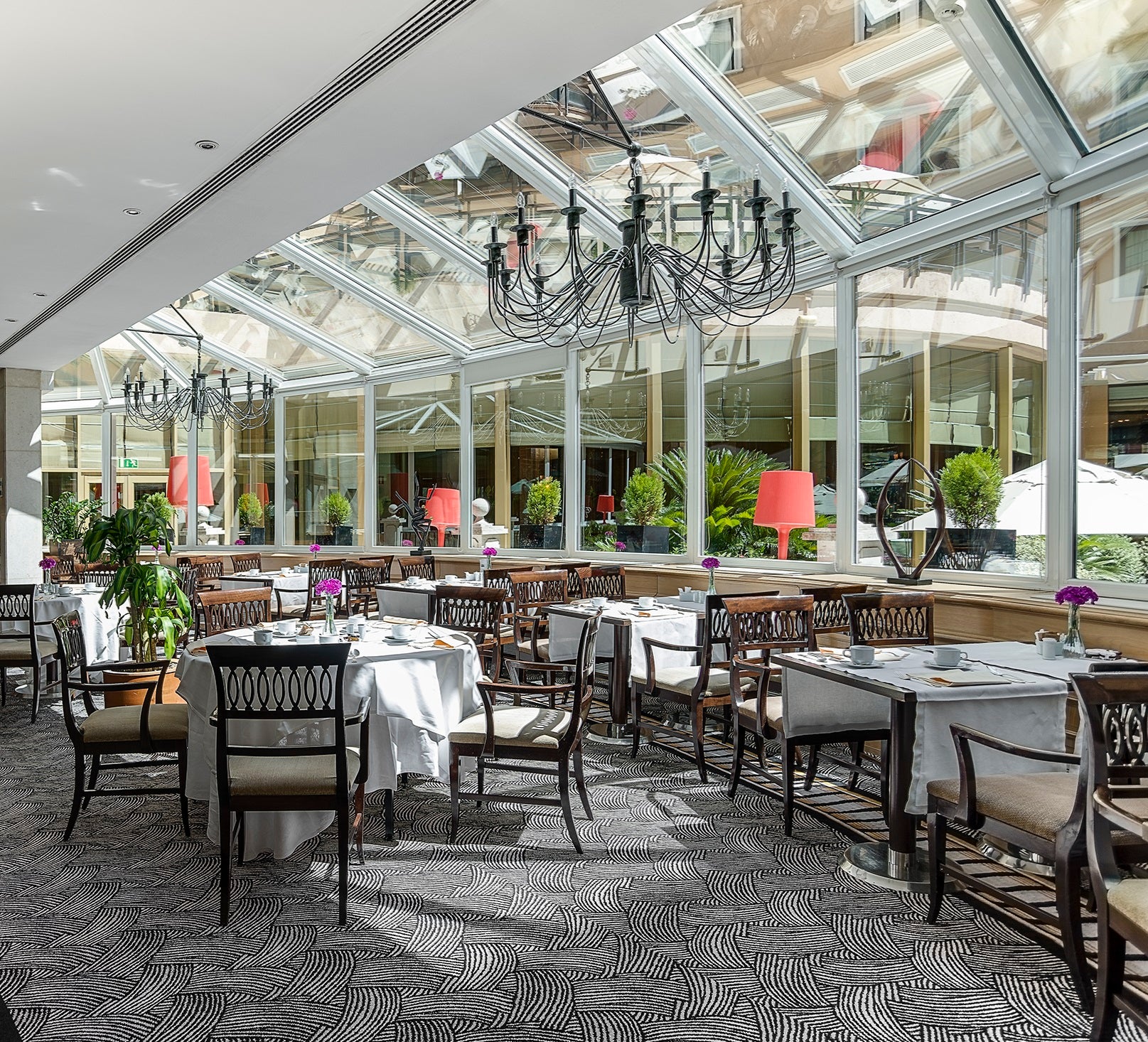 The hotel’s El Jardin Restaurant provides the perfect respite from the bustling city