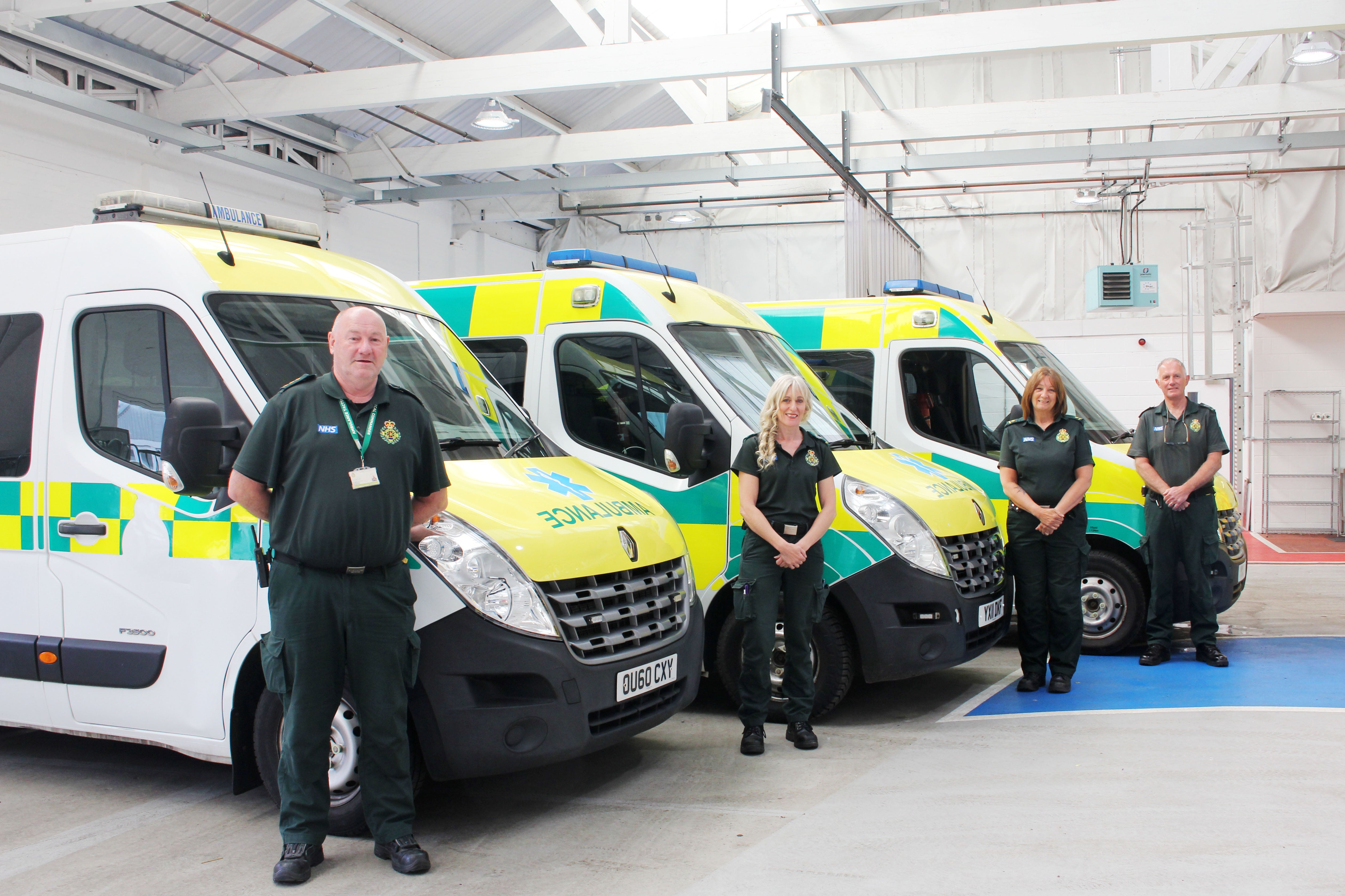 The three ambulances are being driven the 1,200 miles to the Ukrainian border on the back of a lorry (SWASFT/PA)