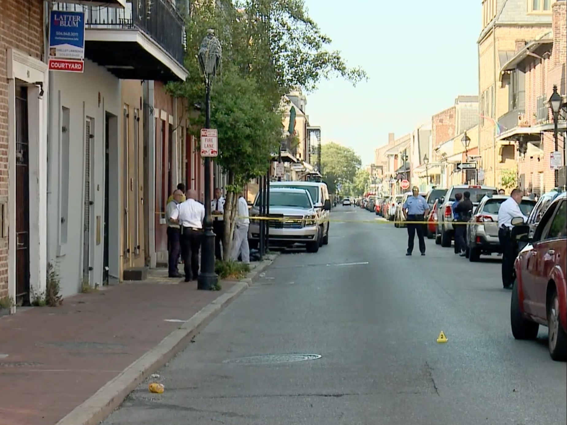 Police at a property in New Orleans where a girl was fatally shot