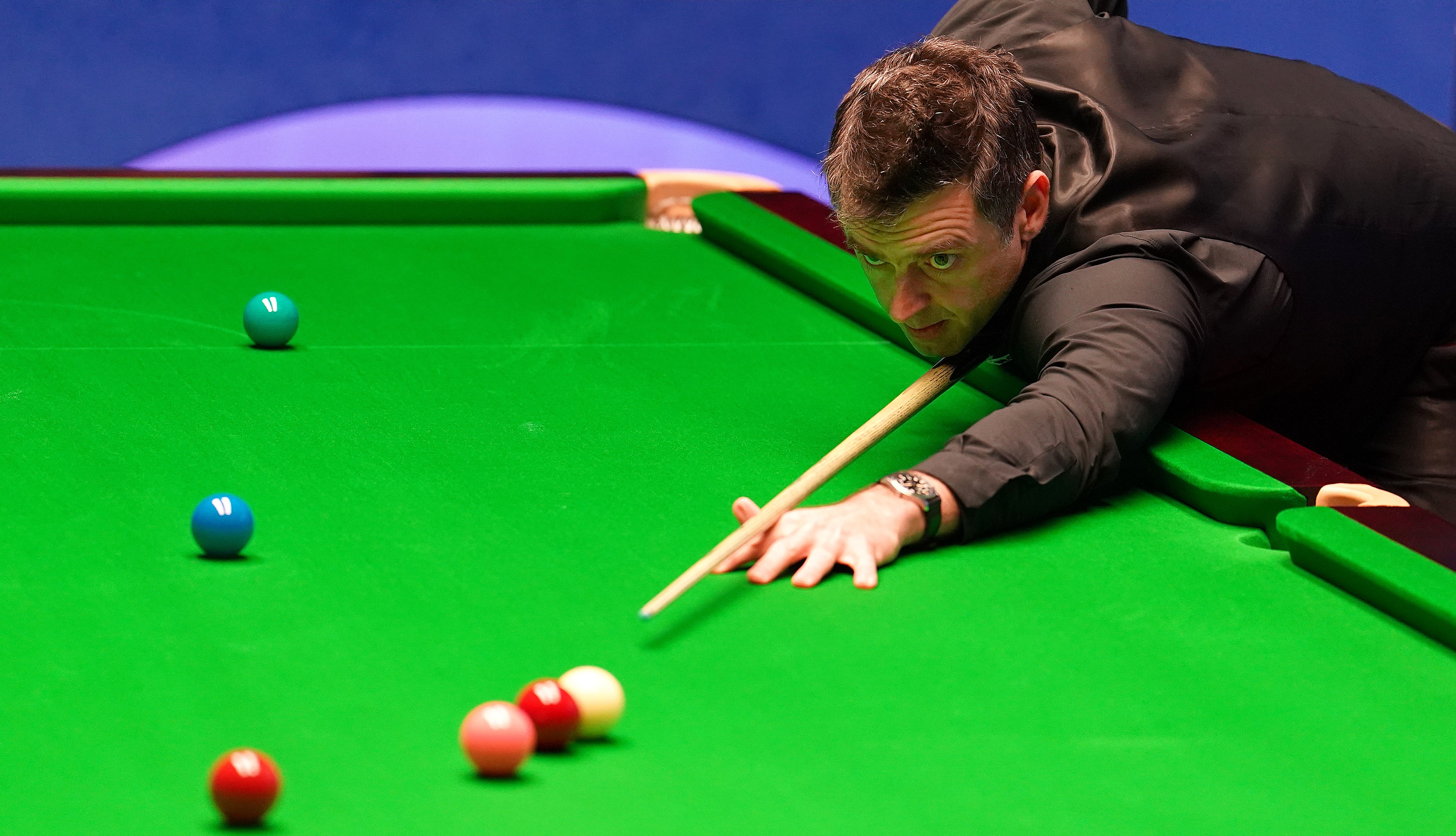 Ronnie O’Sullivan, pictured, polished off victory over Stephen Maguire (Martin Rickett/PA)