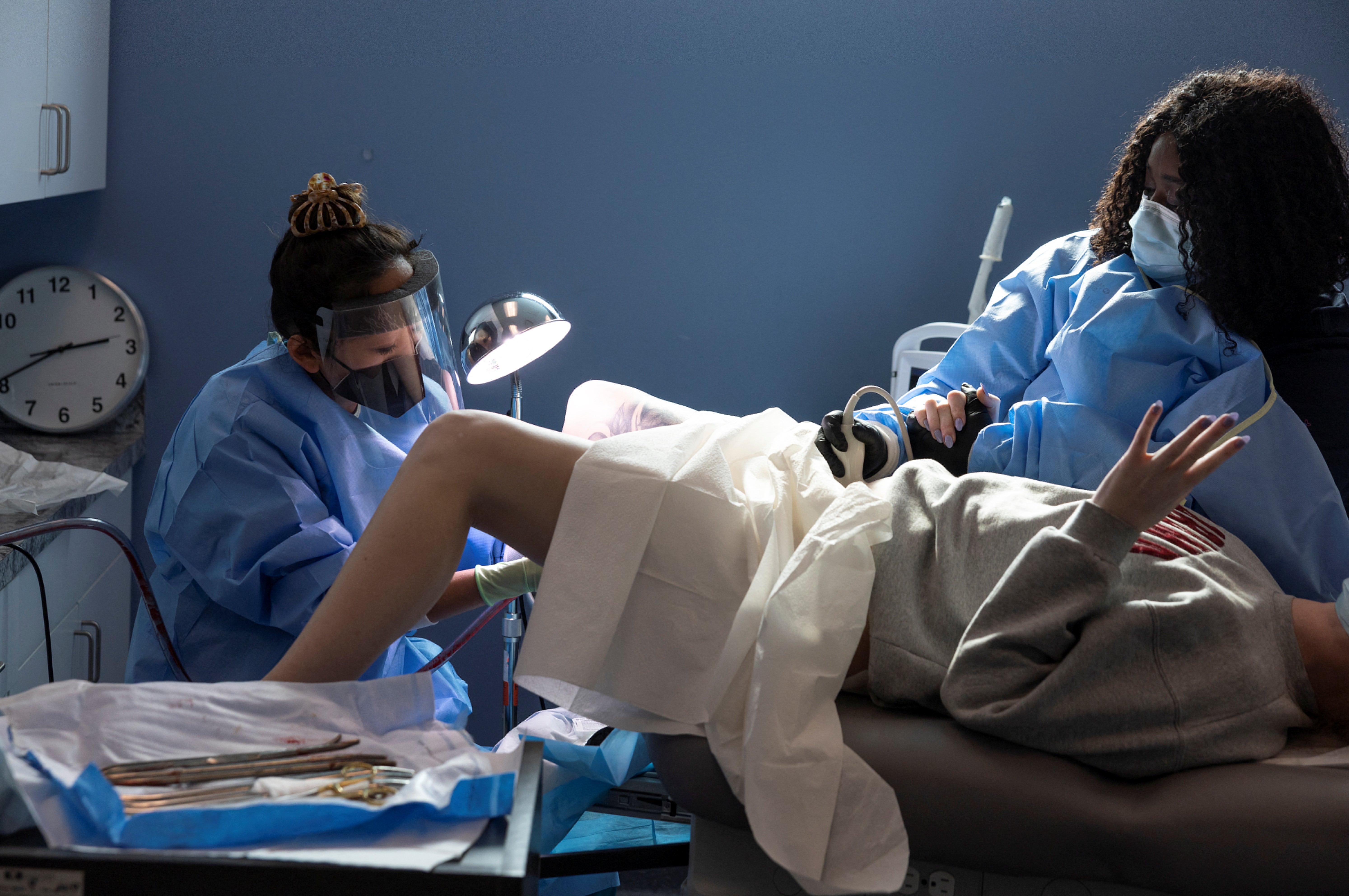 Dr Shelly Tien performs an abortion while a nurse assists with ultrasound during the procedure at Planned Parenthood in Birmingham, Alabama