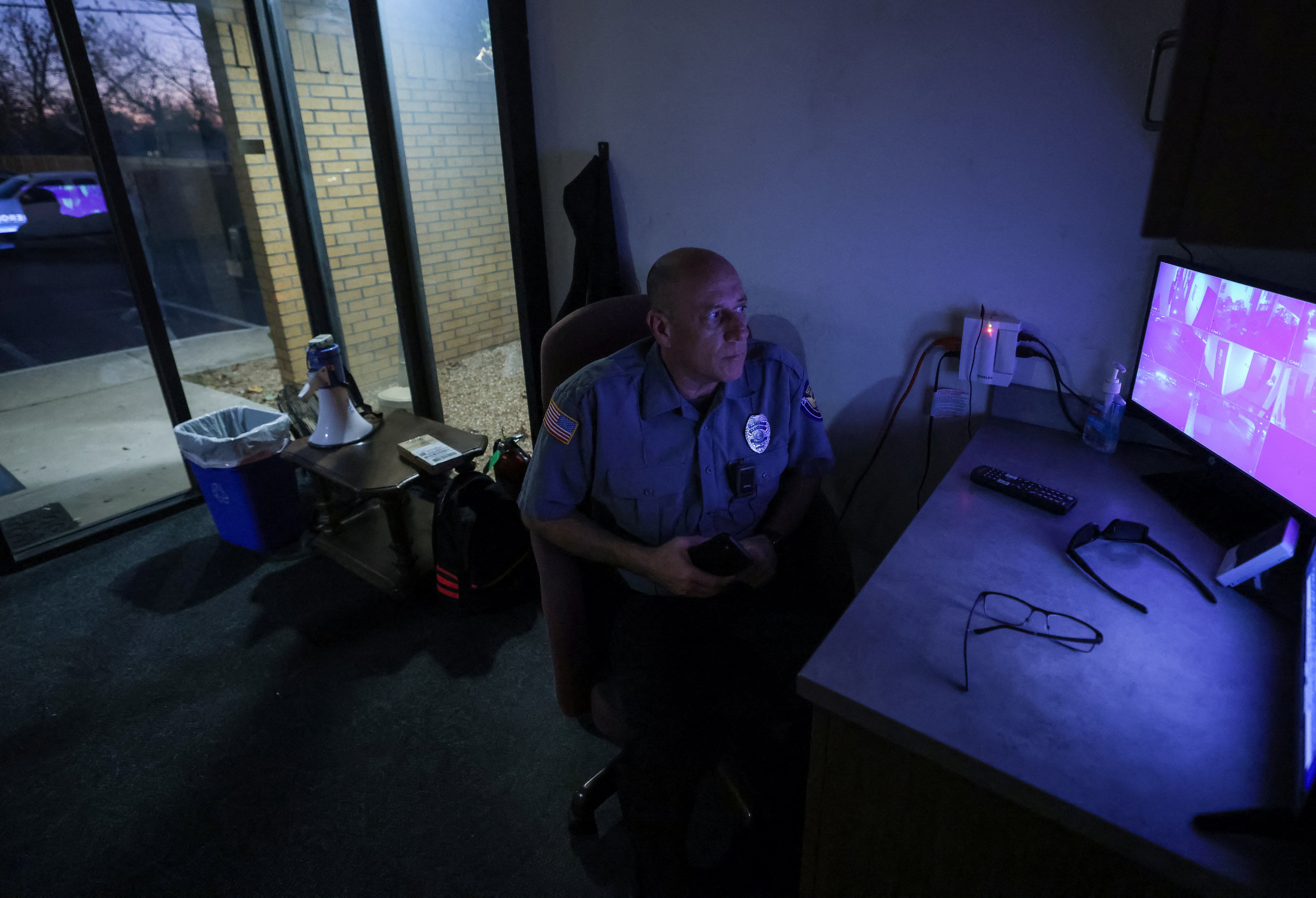 Security guard Louis works at the entrance of the Trust Women clinic