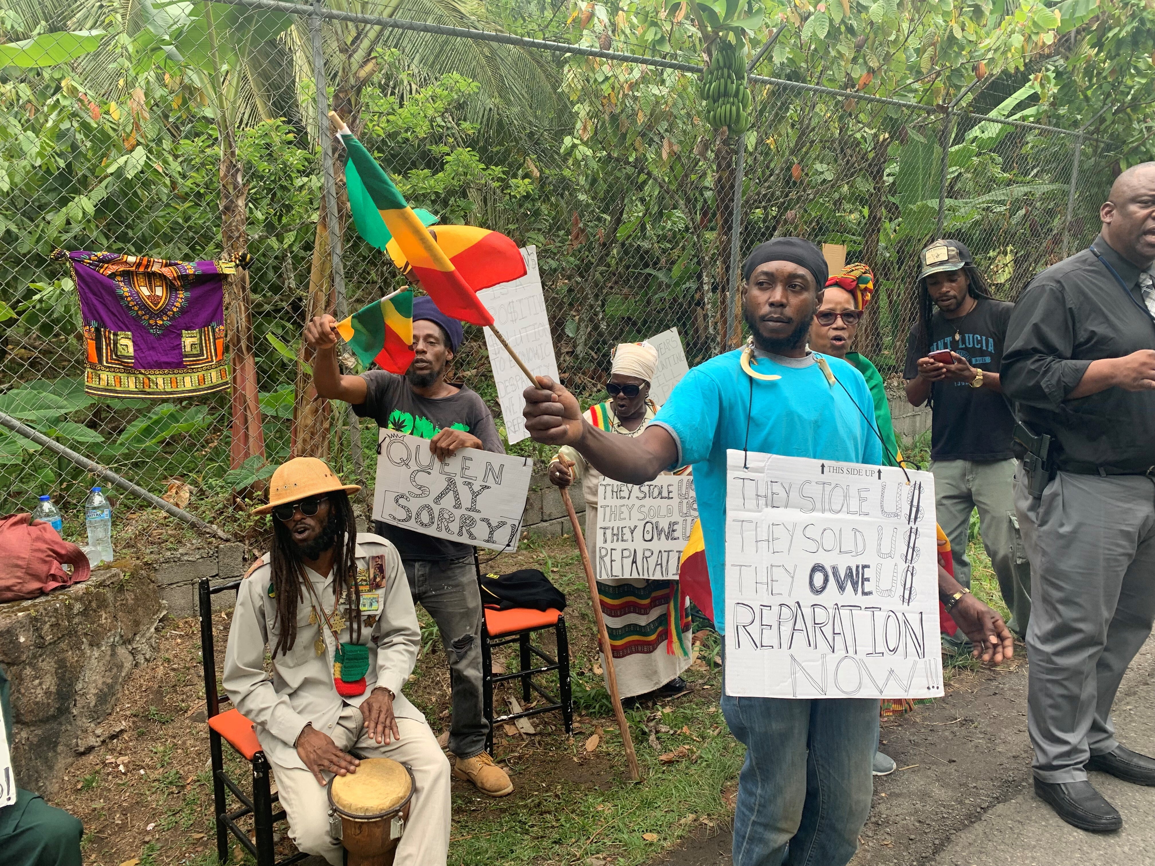 A protest at the Fond Doux Cocoa Plantation in Saint Lucia during the royal visit