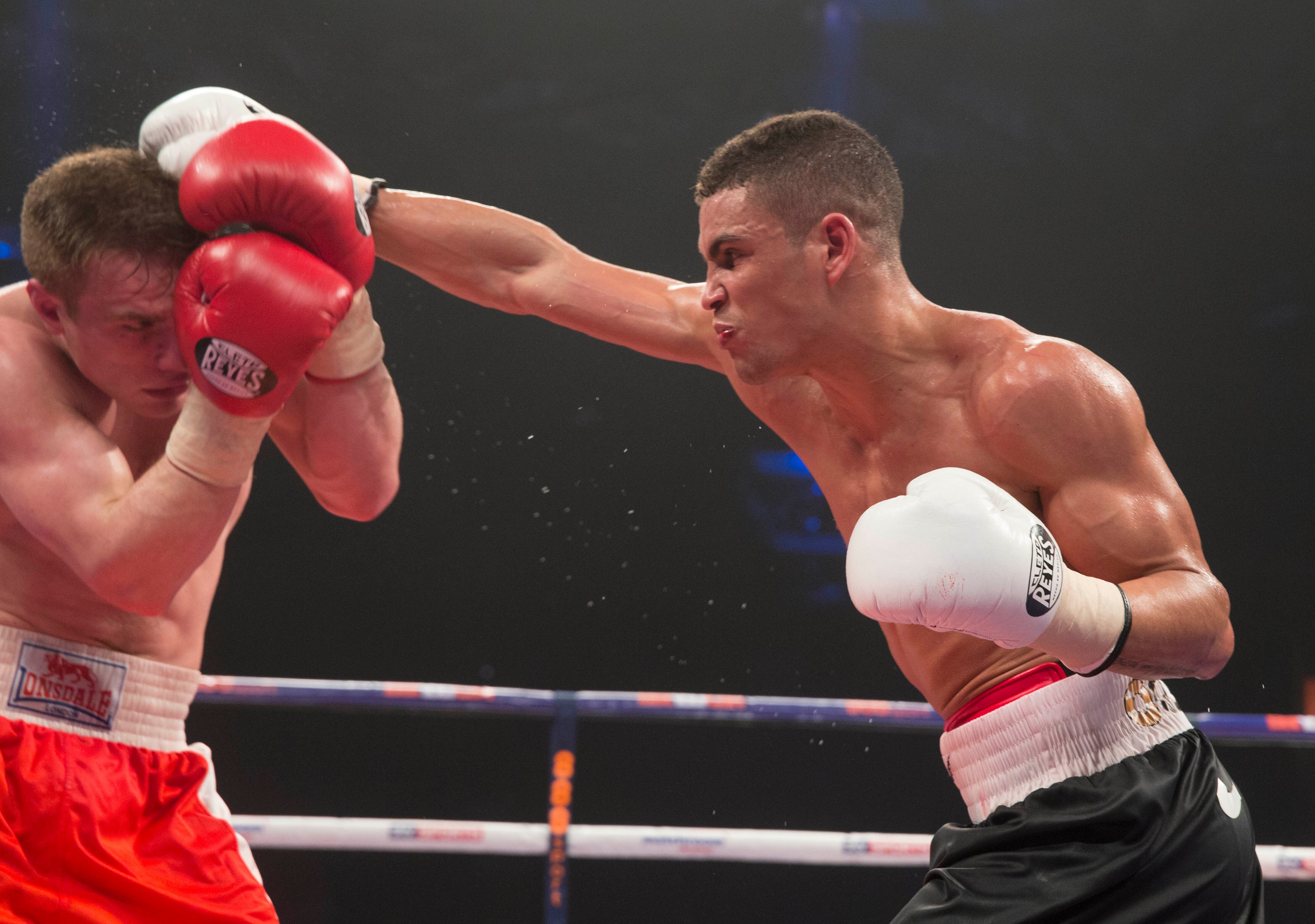 Ogogo (right) won his first 11 professional boxing fights before suffering his injury (Jeff Holmes/PA)