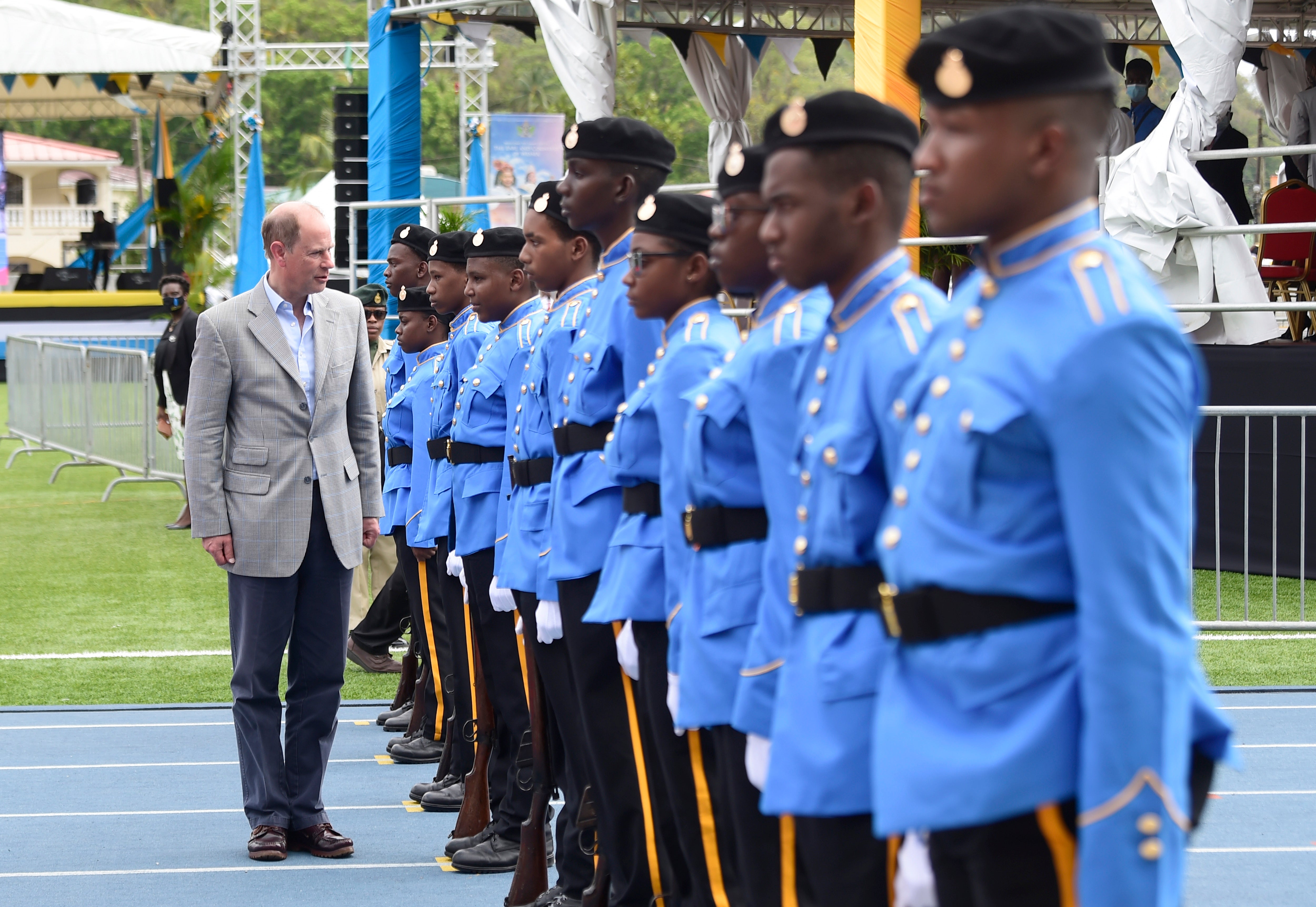 Prince Edward inspects a guard of honour as he attends a performance celebrating Saint Lucia’s young people