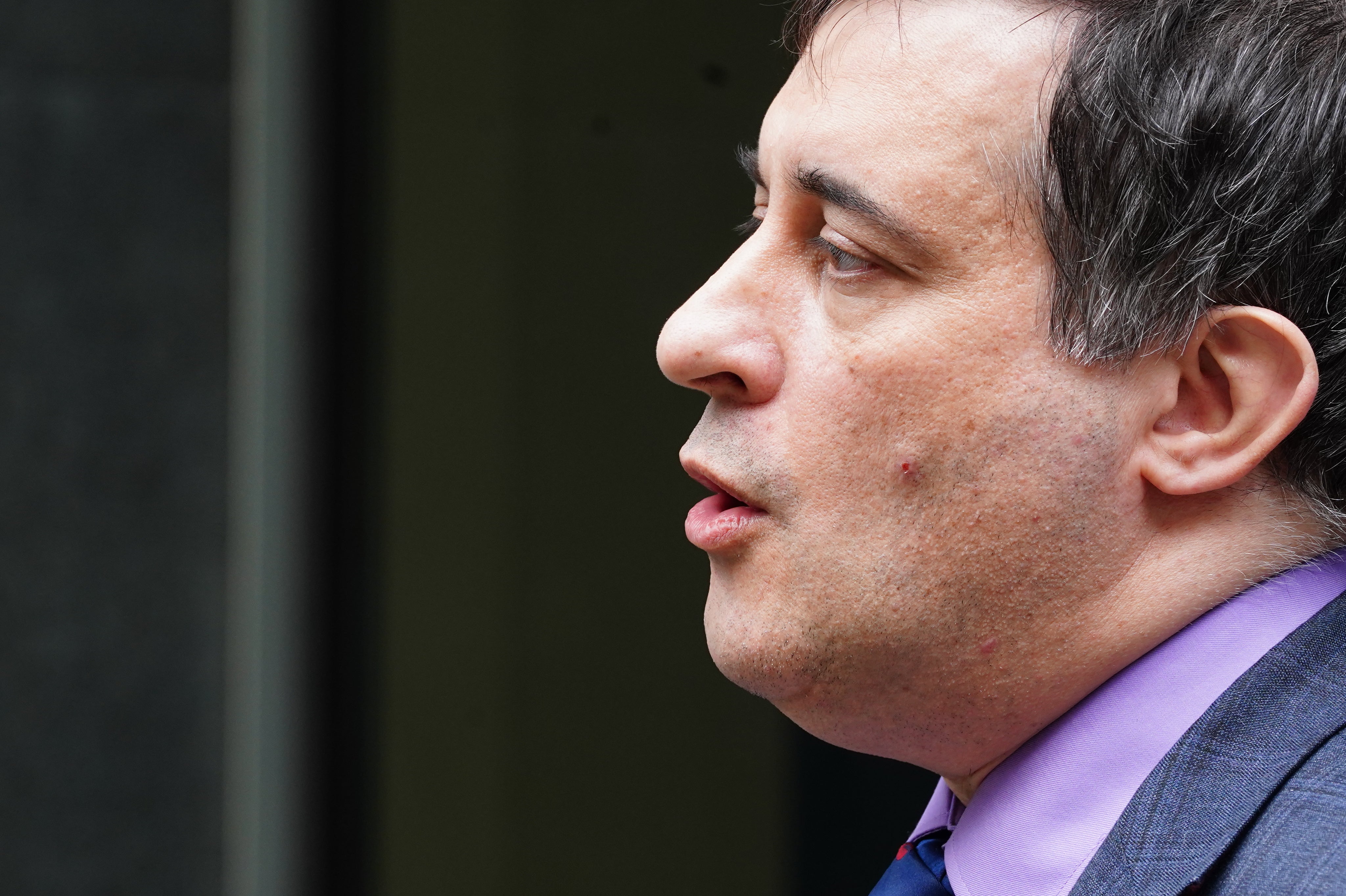 Campaigner Dr Evan Harris speaking to the media outside the Rolls Building in central London, after having a statement read out in open court after settling a legal action against News Group Newspapers (NGN) over phone hacking claims. Picture date: Thursday April 28, 2022 (Ian West/PA)