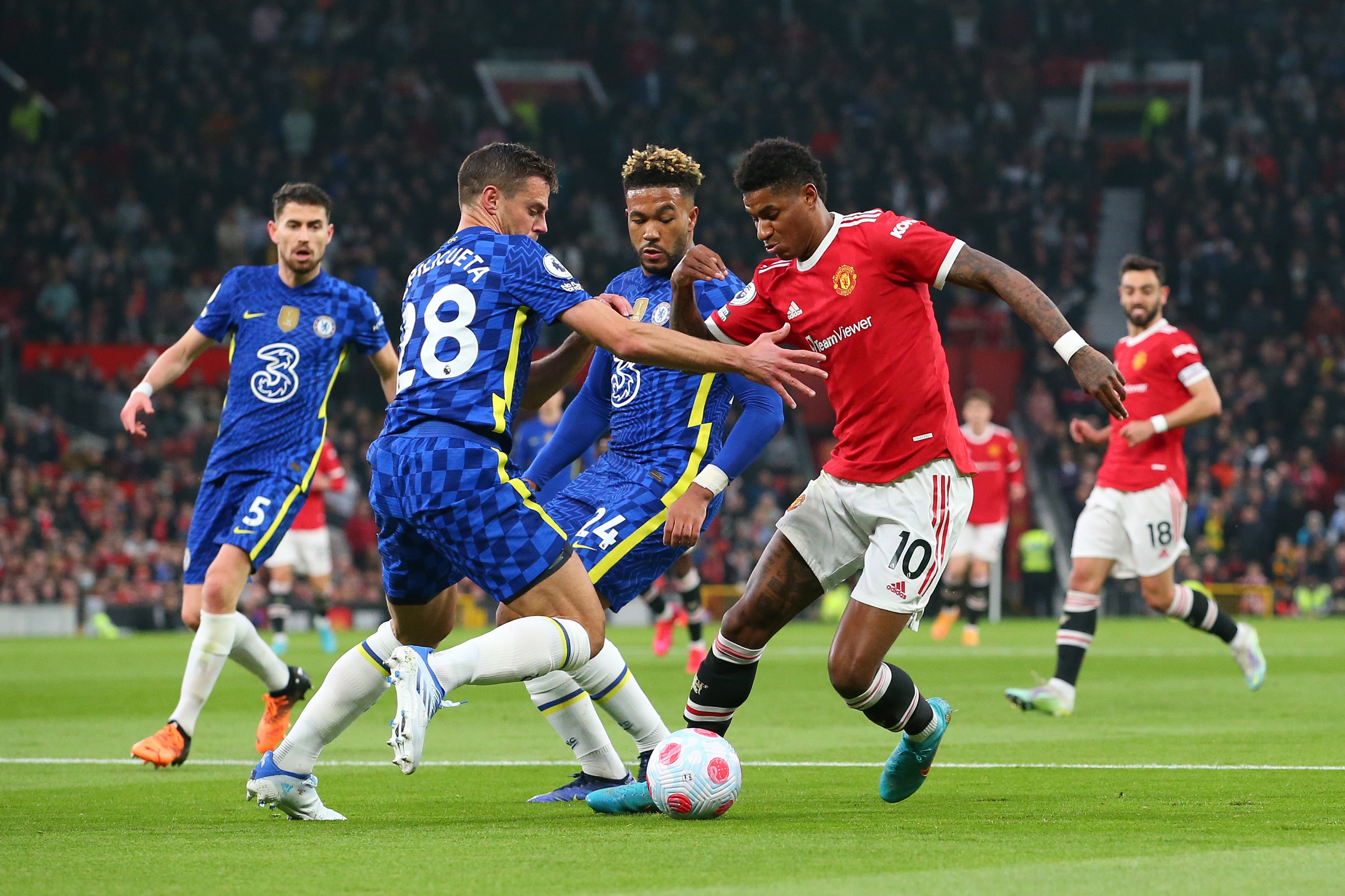 Marcus Rashford tries to evade Cesar Azpilicueta’s tackle