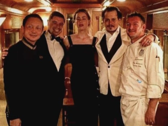 A photo of Johnny Depp and Amber Heard during their honeymoon on the Orient Express from Bangkok to Singapore