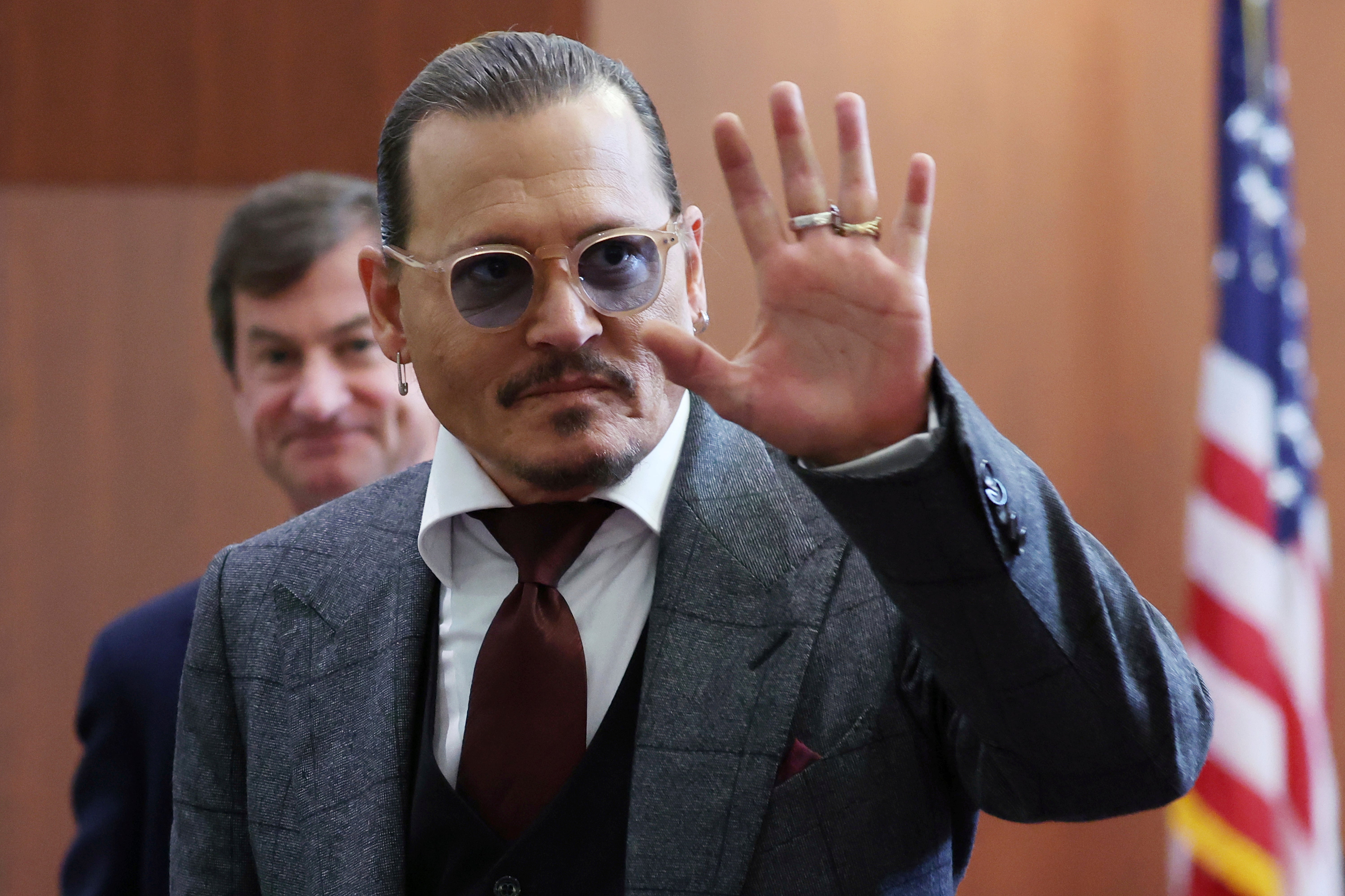 Bizarre moment Johnny Depp laughs as security guard speaks about his penis in court 