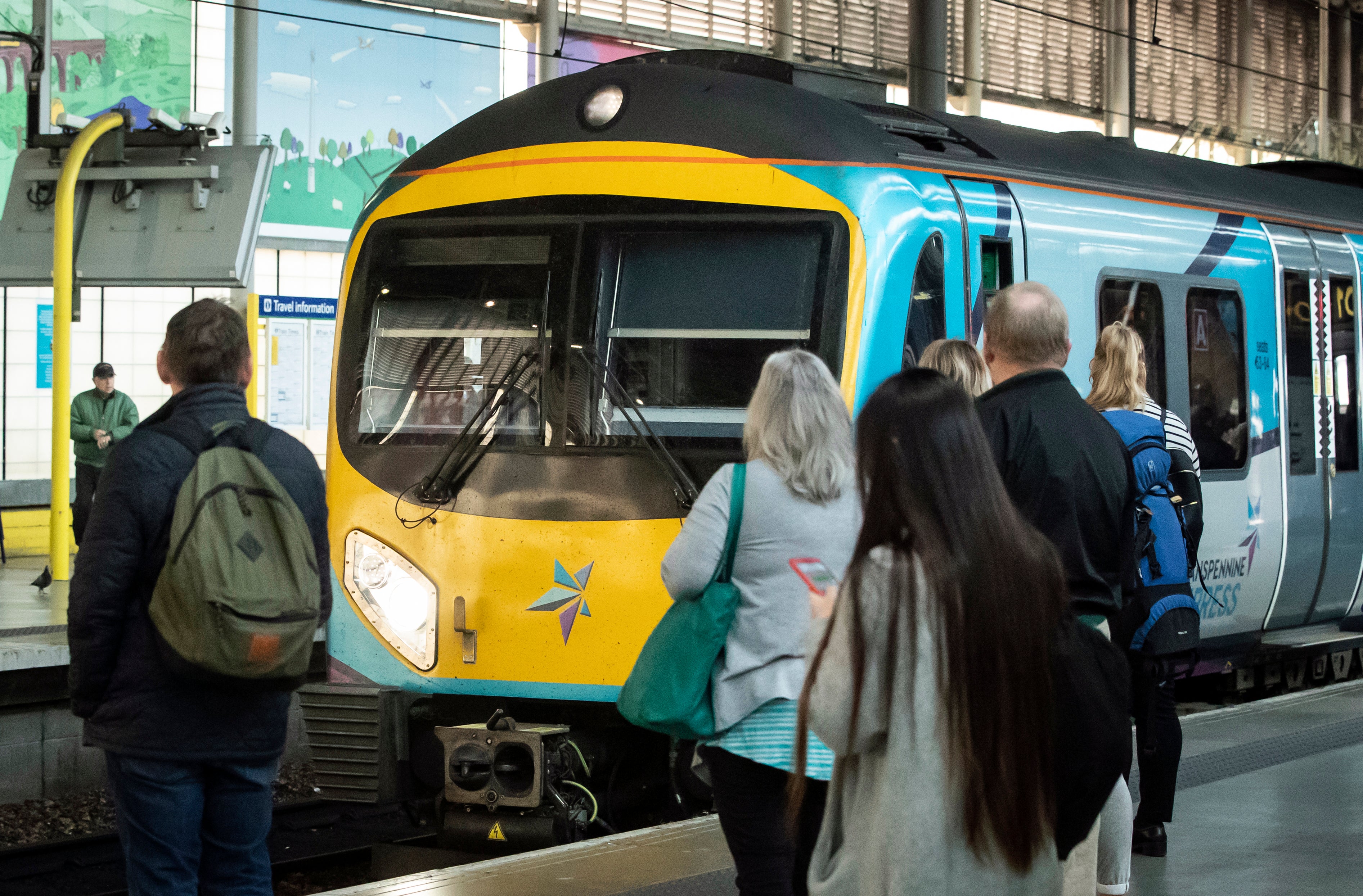 Rail passengers embarking on a bank holiday getaway face disruption due to strike action and engineering projects (Danny Lawson/PA)