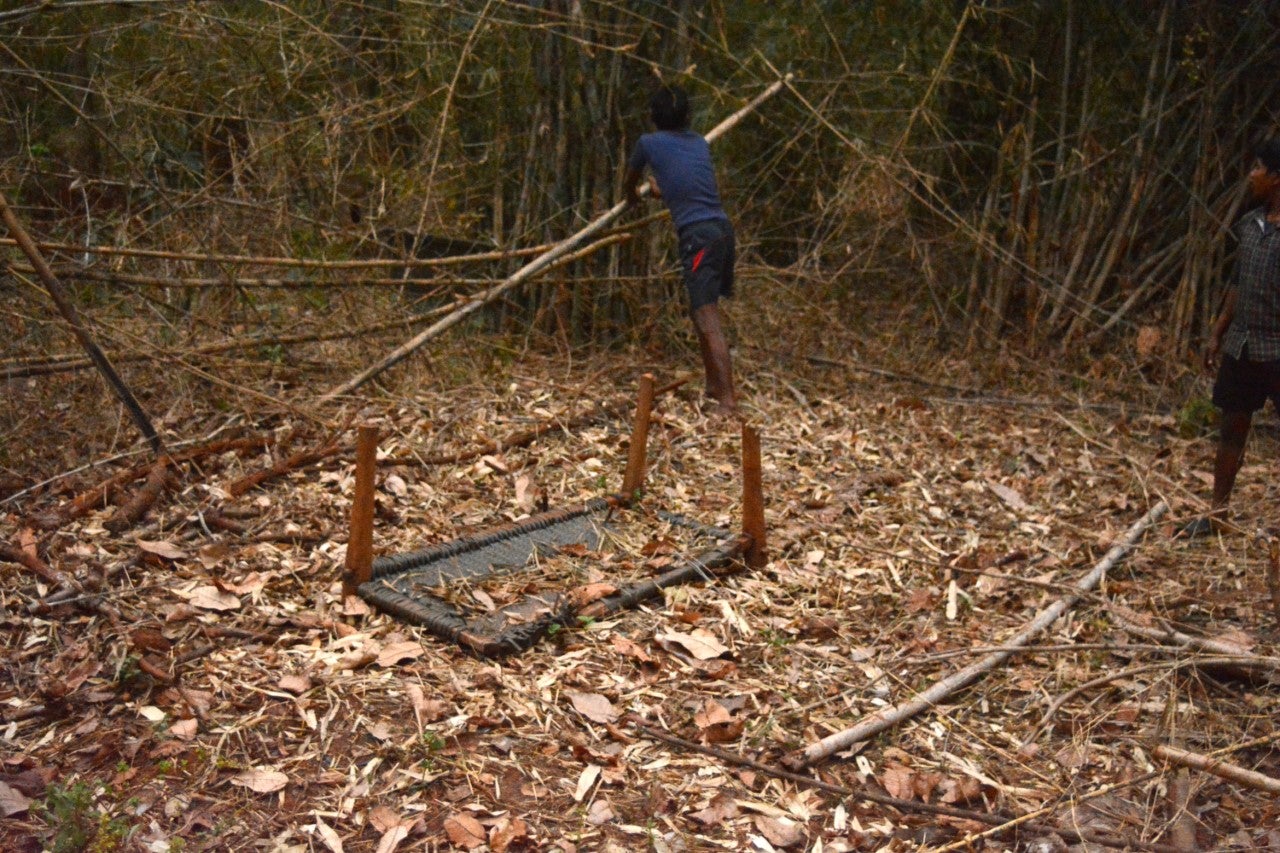 Badru Madvi’s remains preserved inside a pit dug, with the plot of land marked by an inverted charpoy