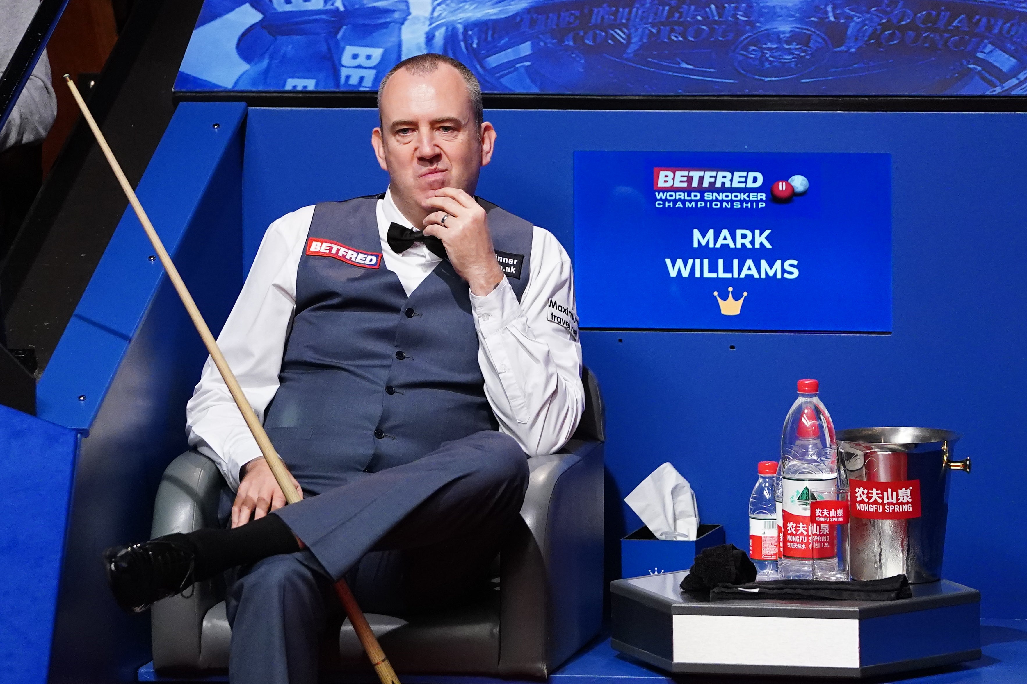 Mark Williams trails Judd Trump by six frames (Zac Goodwin/PA)