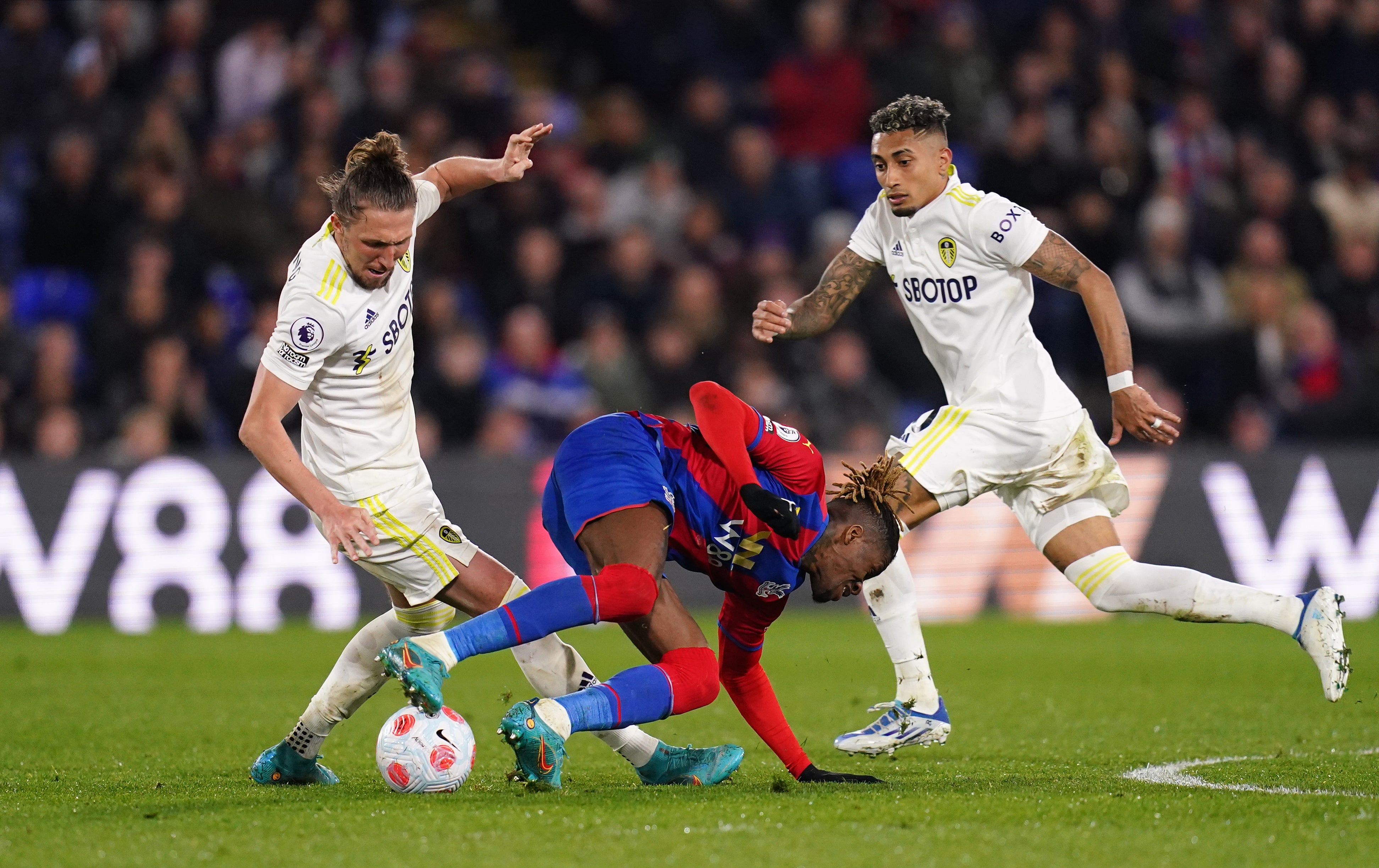 Wilfried Zaha (centre) has been defended by Crystal Palace manager Patrick Vieira after Leeds midfielder Kalvin Phillips said the winger ‘dives a lot’ (John Walton/PA)