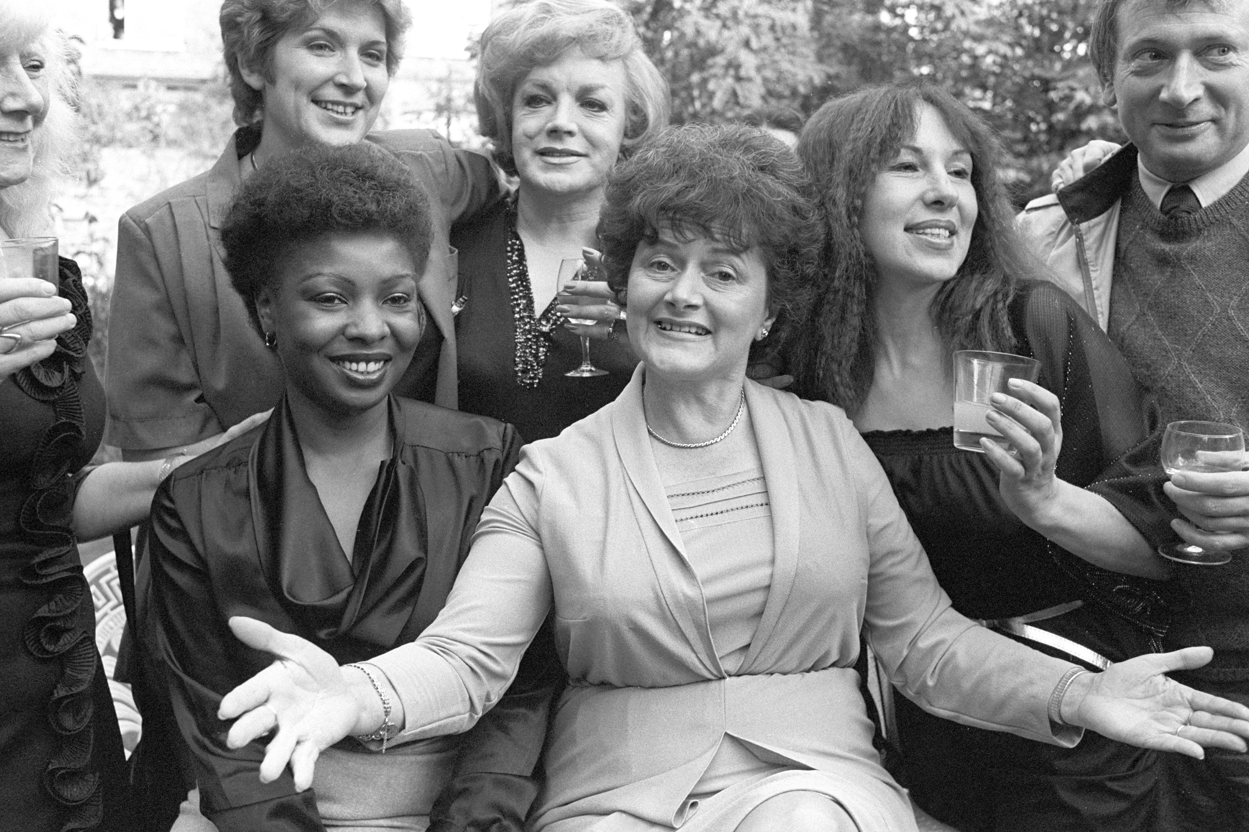 Cynthia Payne (centre) and friends at her Streatham home, where a party was given to launch her memoir