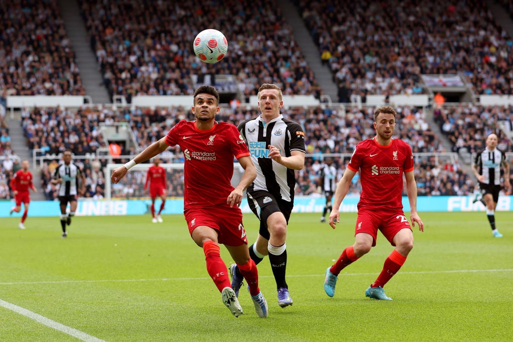 Luis Diaz is challenged by the home side’s Matt Targett