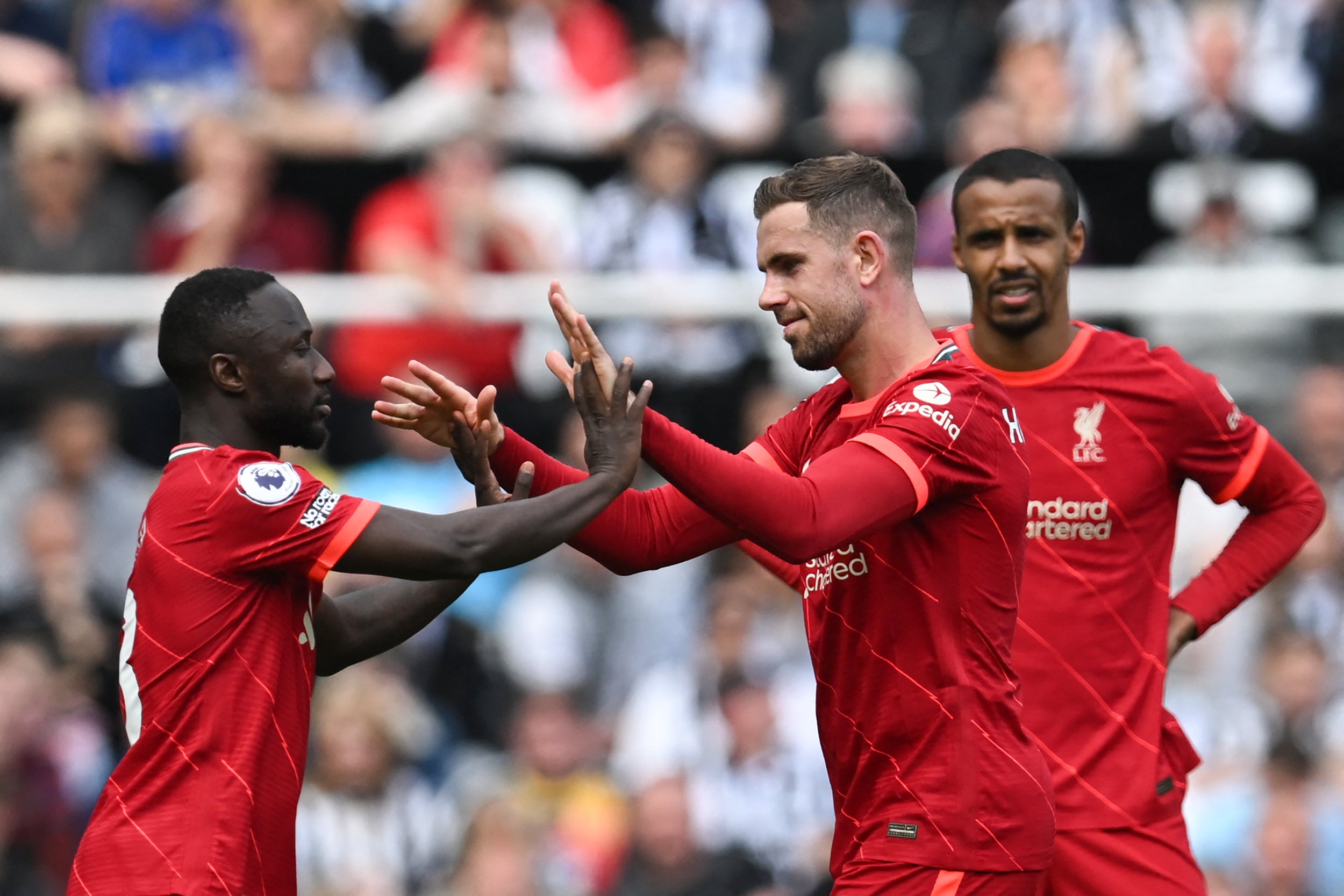 James Milner (right) leaves the field after an impressive display