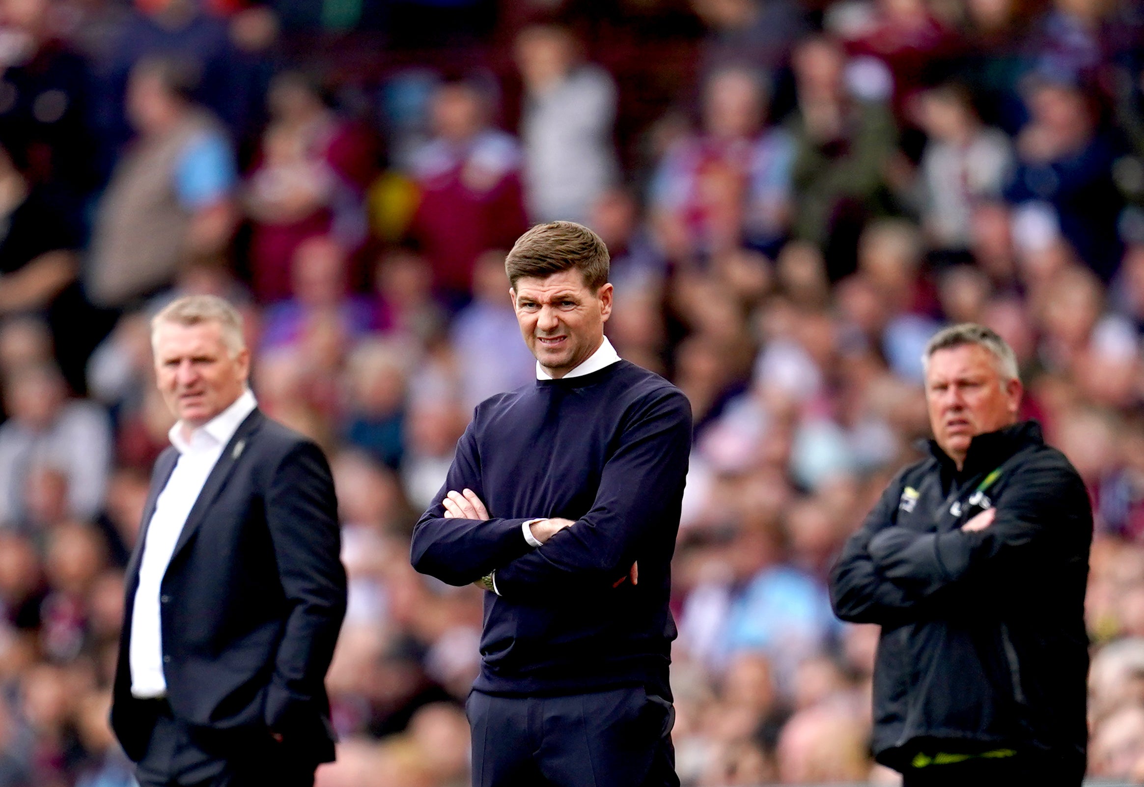 Steven Gerrard, centre, saw his team beat Norwich on Saturday (PA)