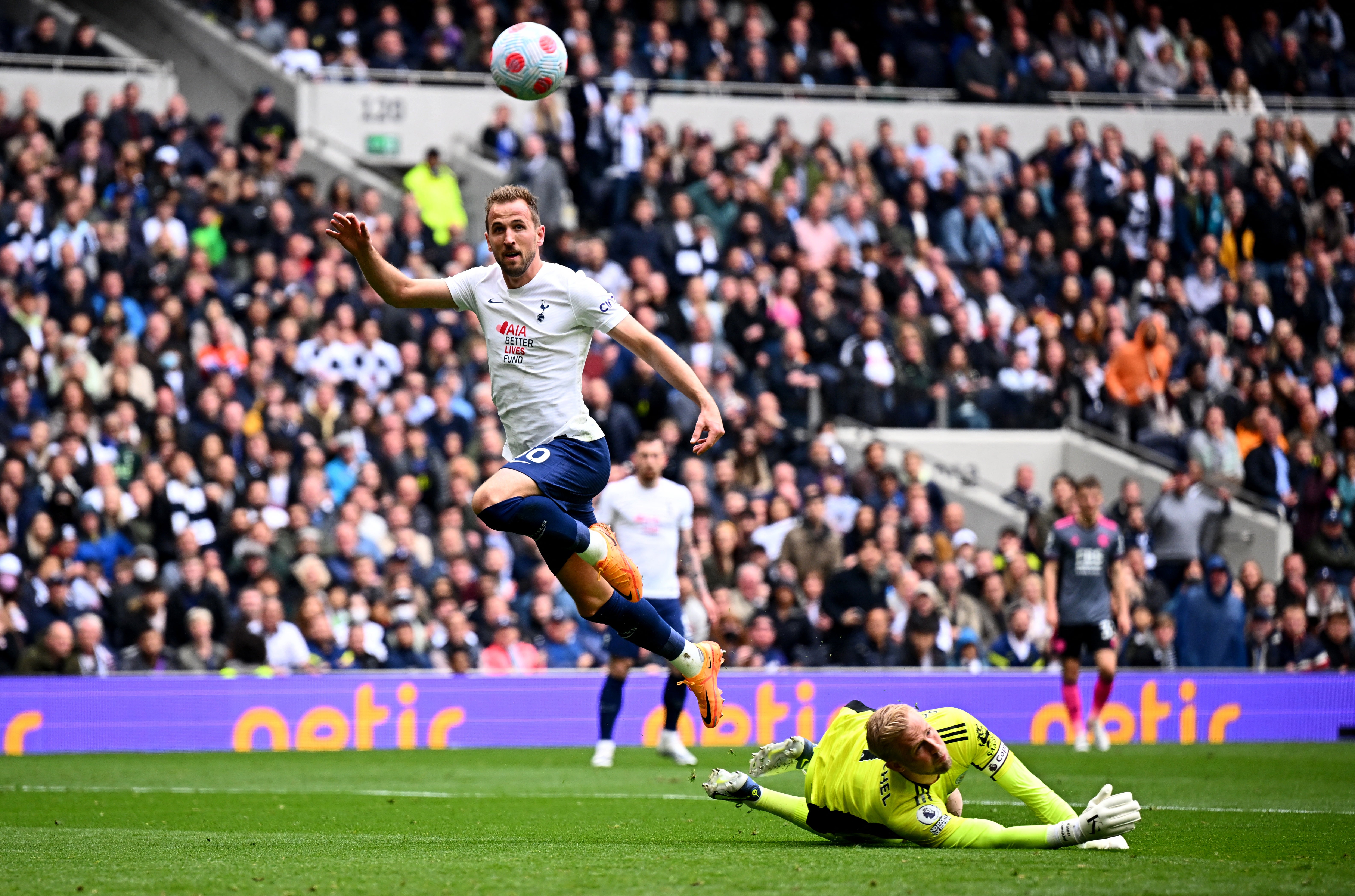 Harry Kane in action with Kasper Schmeichel