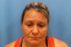 Alabama state worker is mauled to death by pack of seven dogs while following up on attack by same dogs