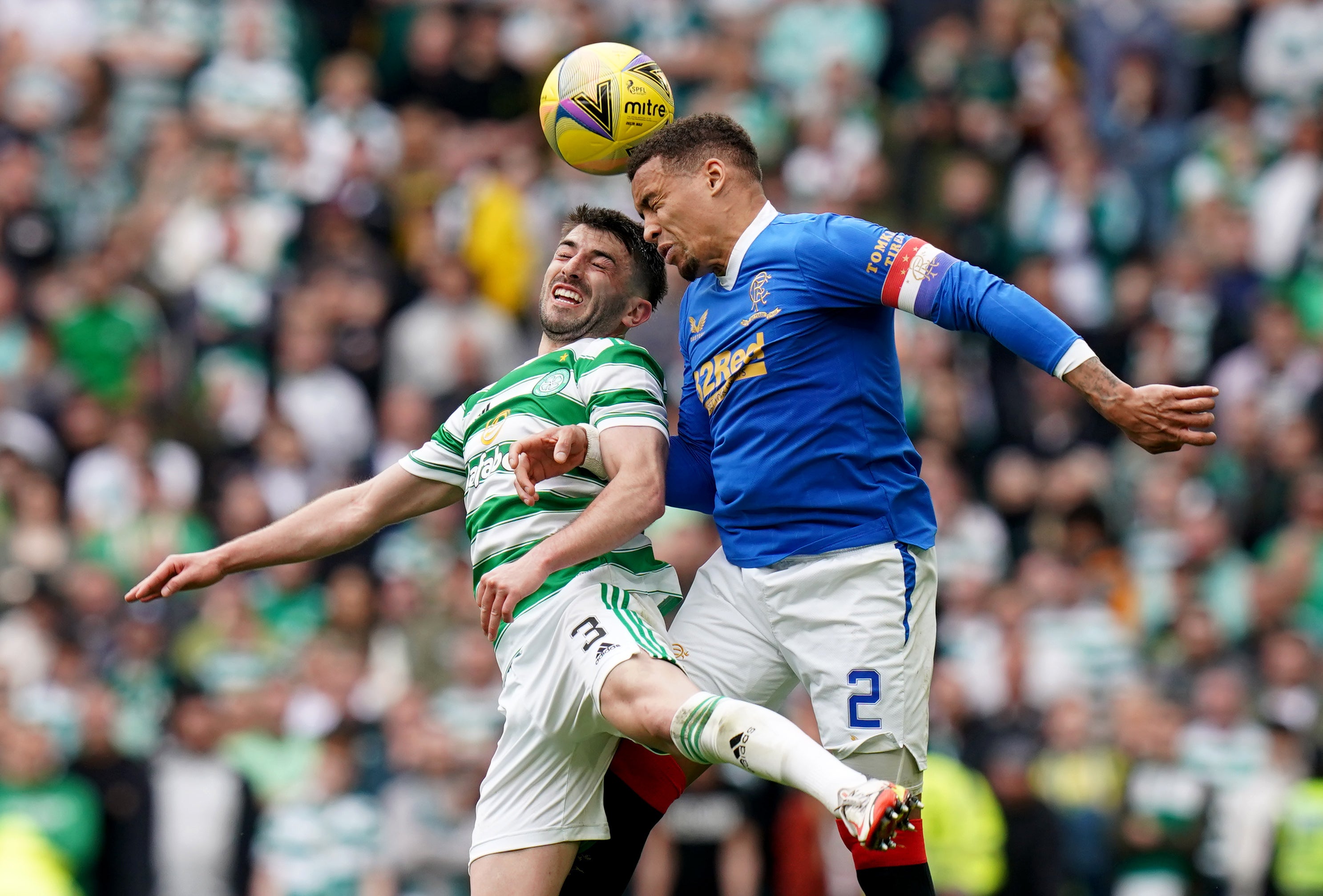 Celtic’s Greg Taylor battles for the ball with Rangers’James Tavernier during the 1-1 cinch Premiership draw (Jane Barlow/PA Images).