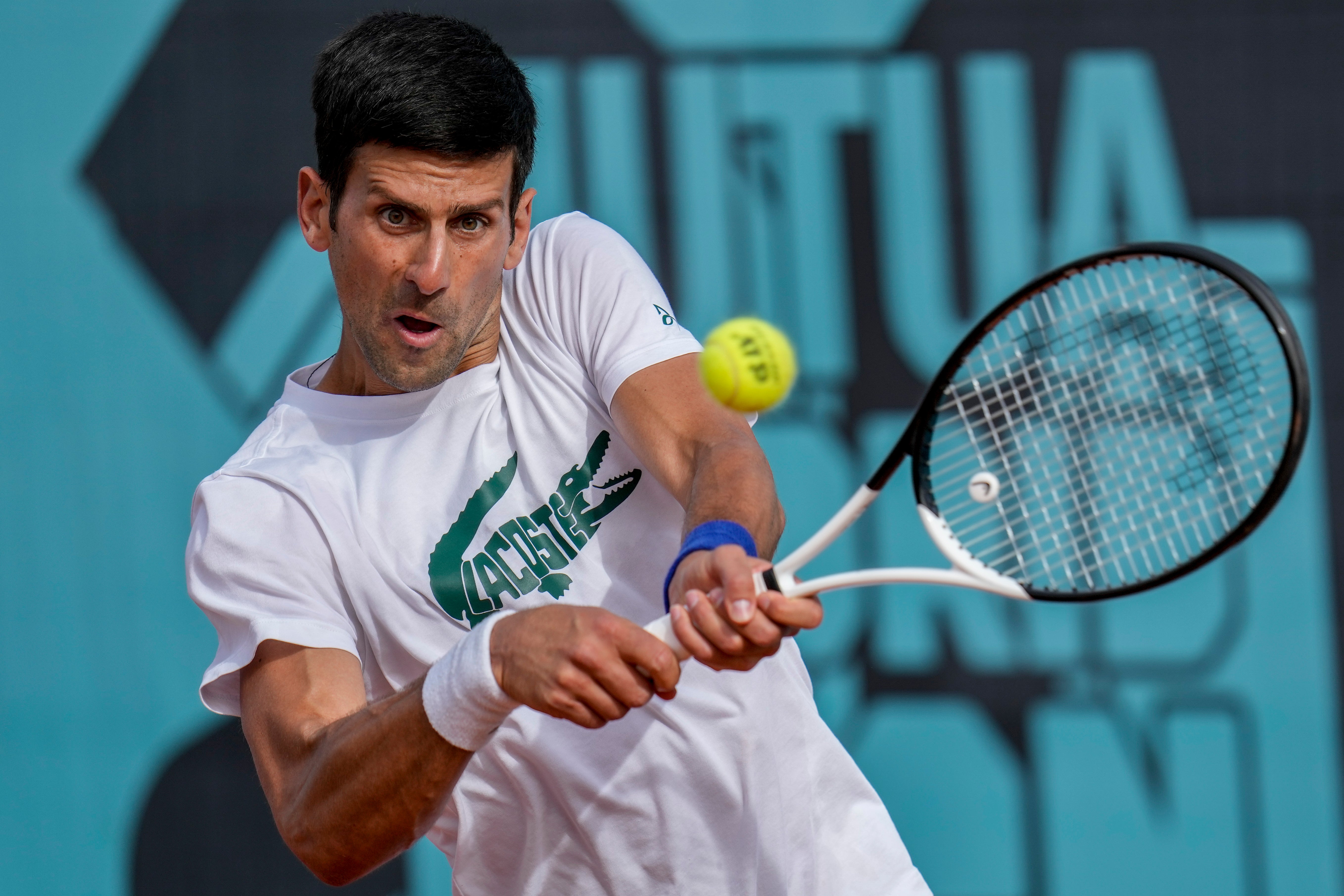 Novak Djokovic practising in Madrid ahead of the Madrid Open (Manu Fernandez/AP)