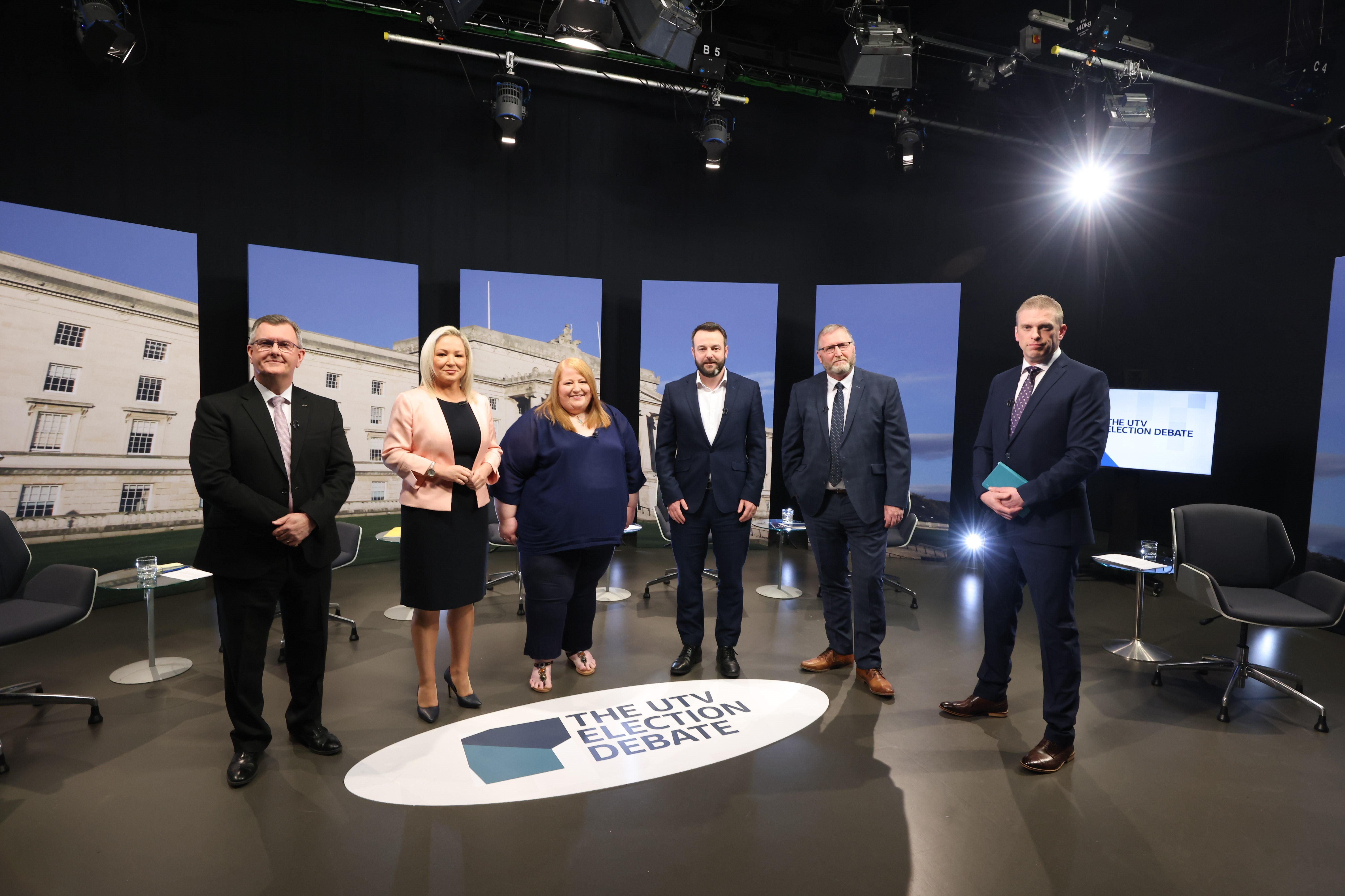 From left: DUP leader Sir Jeffrey Donaldson, Sinn Fein vice-president Michelle O’Neill, Alliance leader Naomi Long, SDLP leader Colum Eastwood, UUP leader Doug Beattie and the UTV Election Debate host Mark Mallett (Kelvin Boyes/PA)