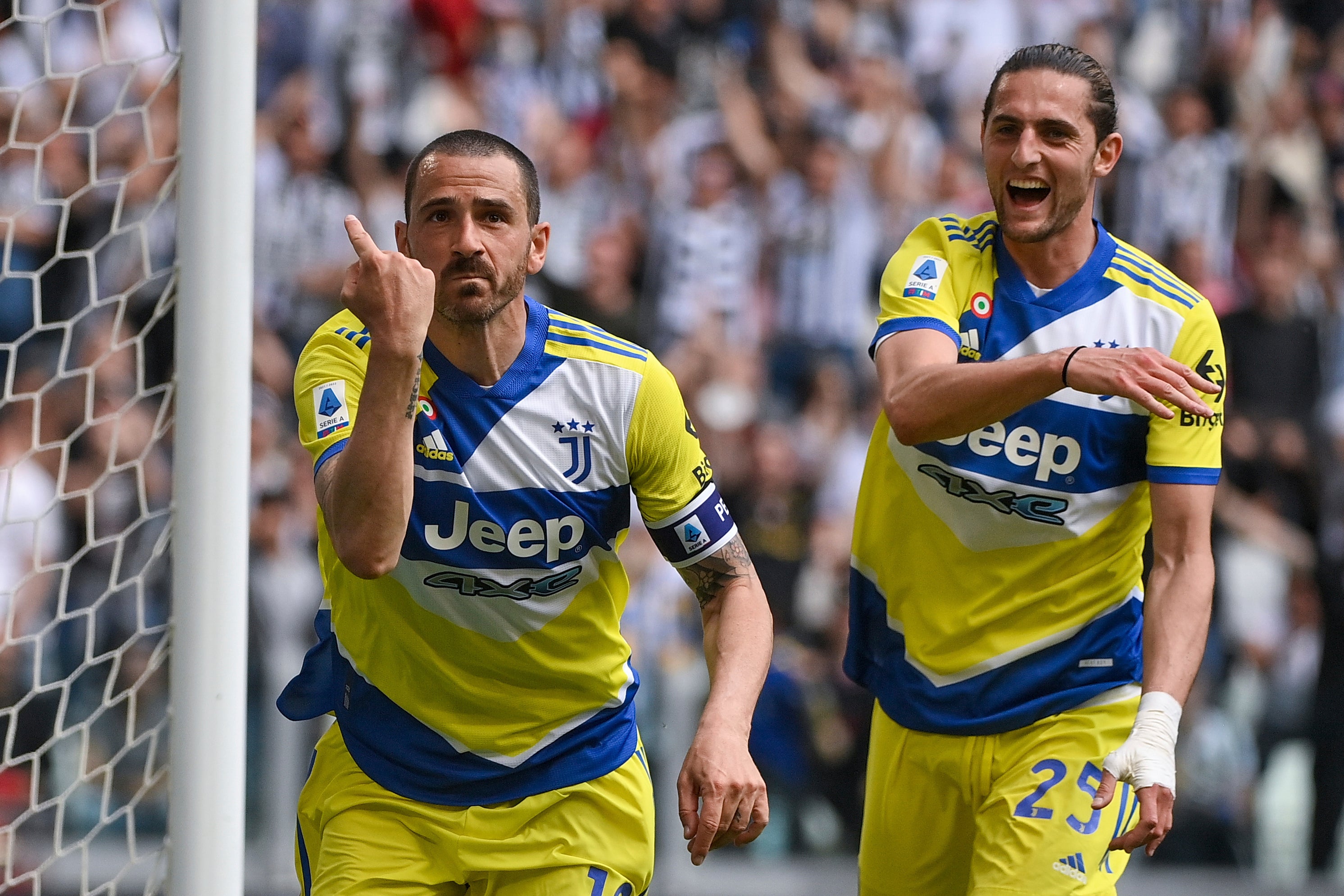 Leonardo Bonucci, left, celebrates with teammate Adrien Rabiot after scoring Juventus’ winner against Venezia (Marco Alpozzi/LaPresse via AP)