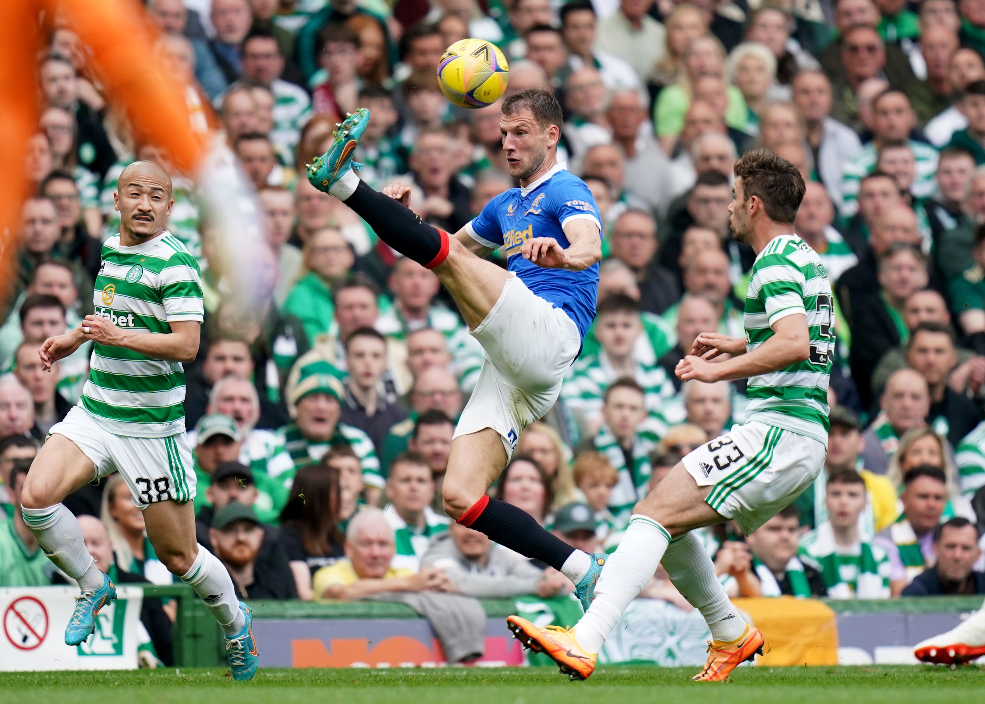 Rangers’ Borna Barisic (centre) clears the ball during the 1-1 draw with Celtic (Jane Barlow/PA Images).