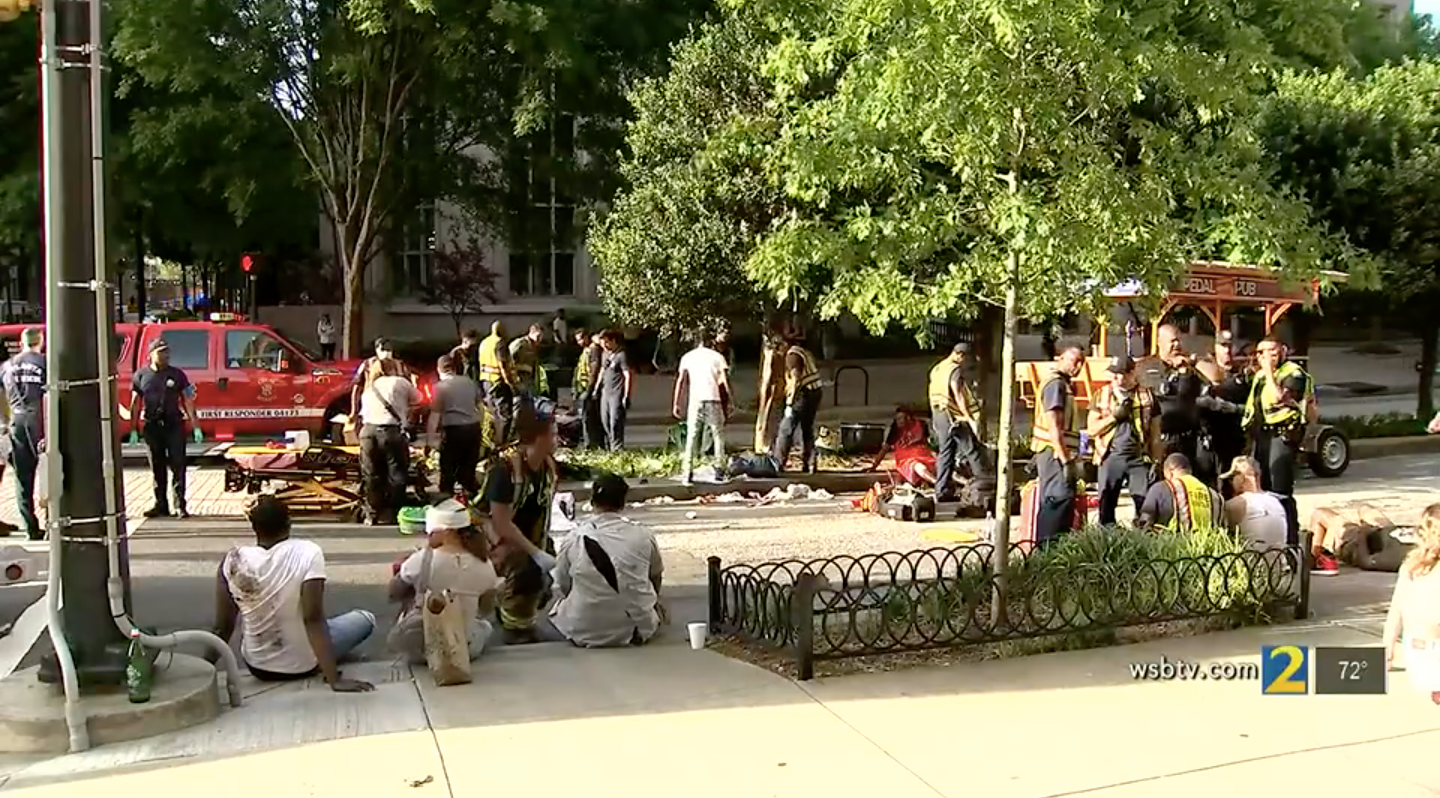 First responders attend to victims of the pedal pub crash in Atlanta, Georgia on Saturday.