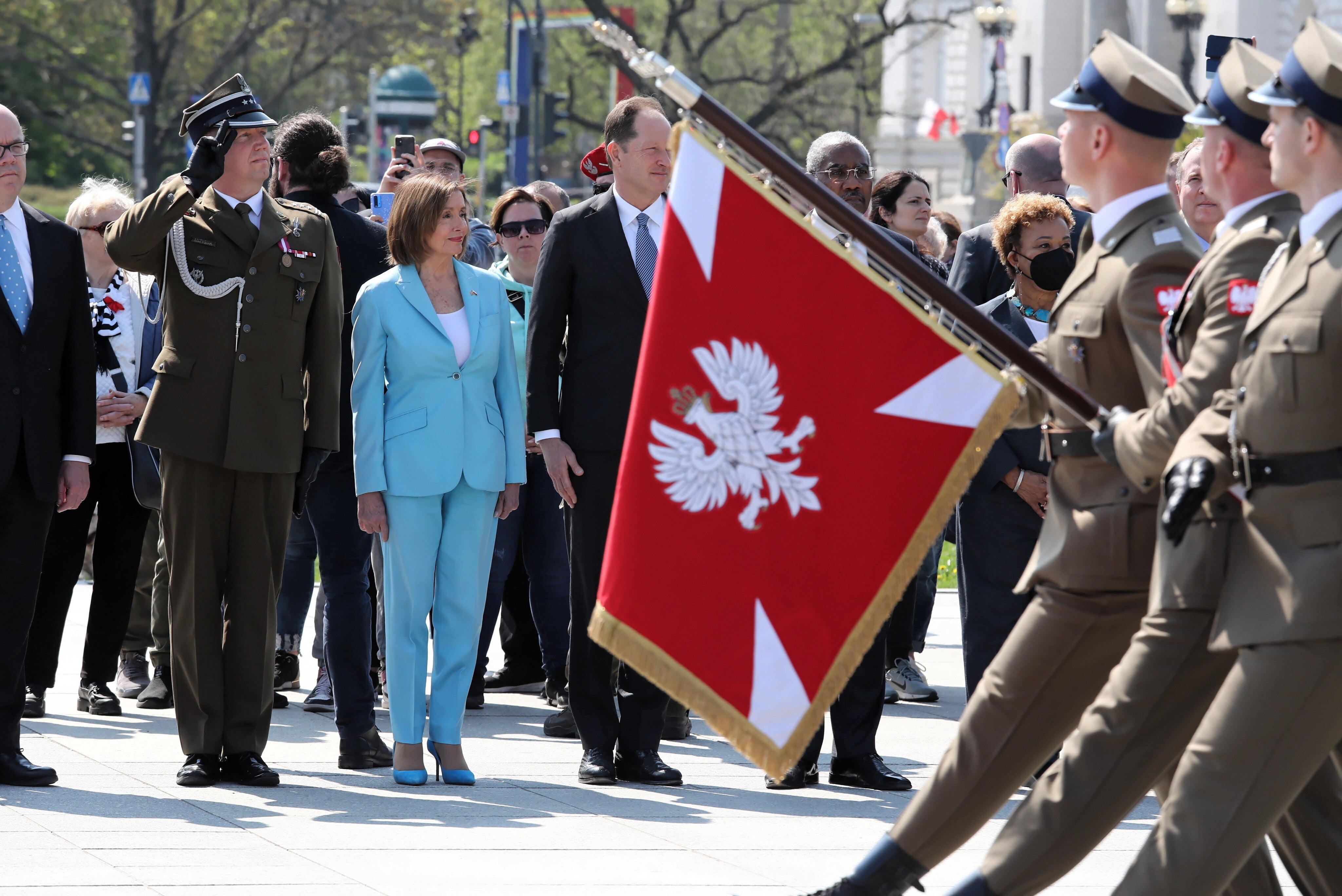 Nancy Pelosi attends a wreath laying ceremony at the Tomb of the Unknown Soldier, at Marshal Jozef Pilsudski Square in Warsaw, Poland, on 2 May 2022